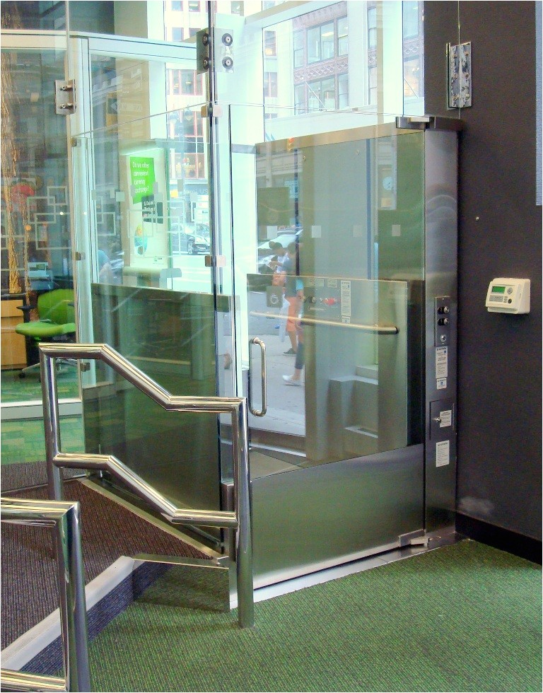 mobility elevator installs high end frameless glass access lifts at td bank branches in new york city