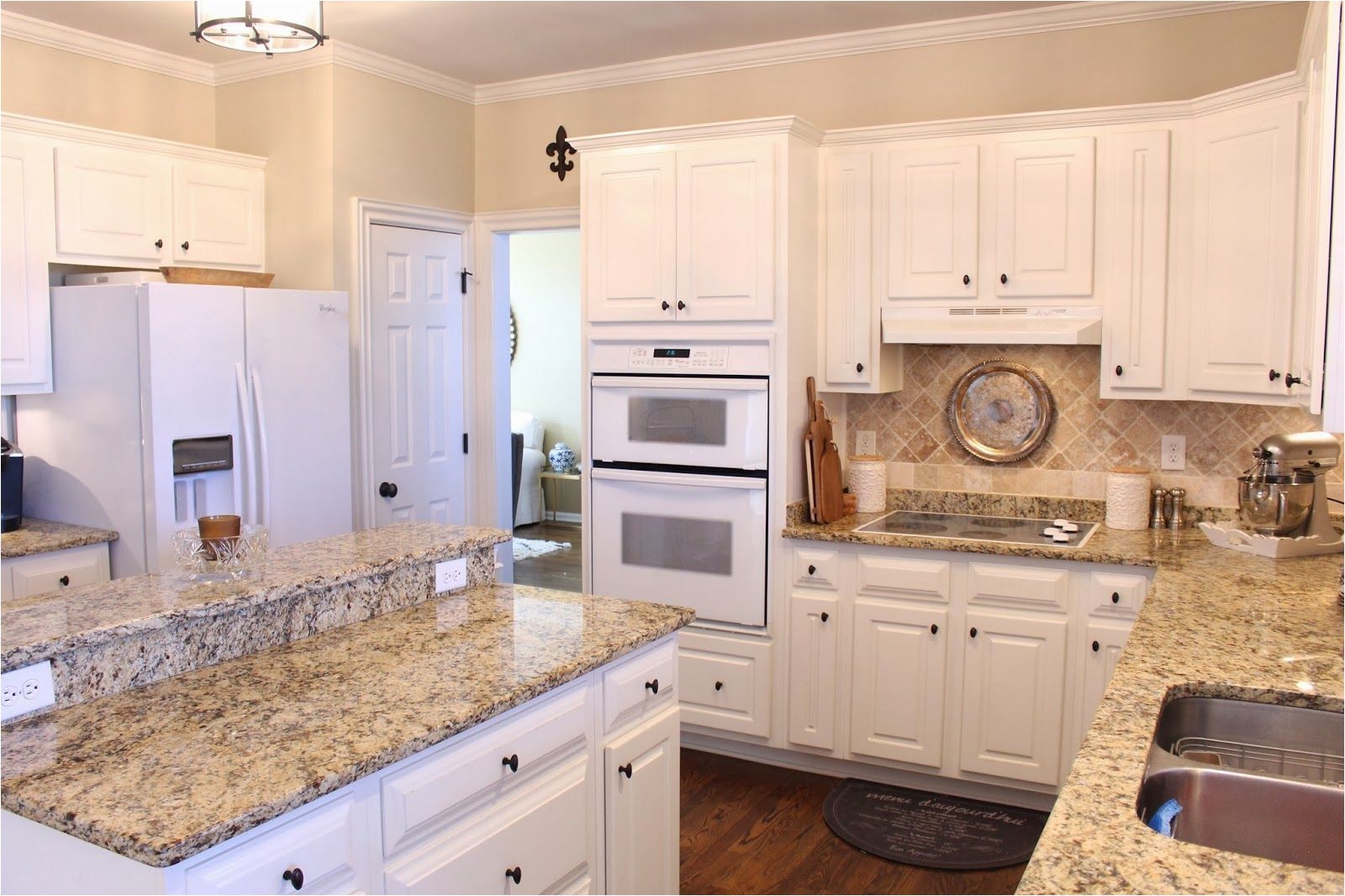 tiffanyd some progress in the kitchen beige kitchen cabinets white cabinets