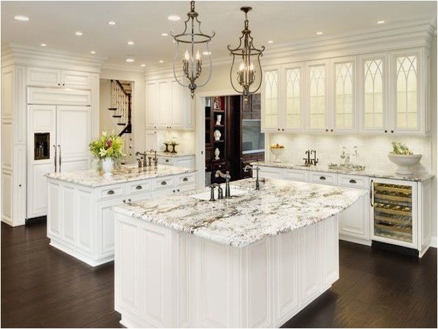 alaska white granite white cabinets backsplash ideas