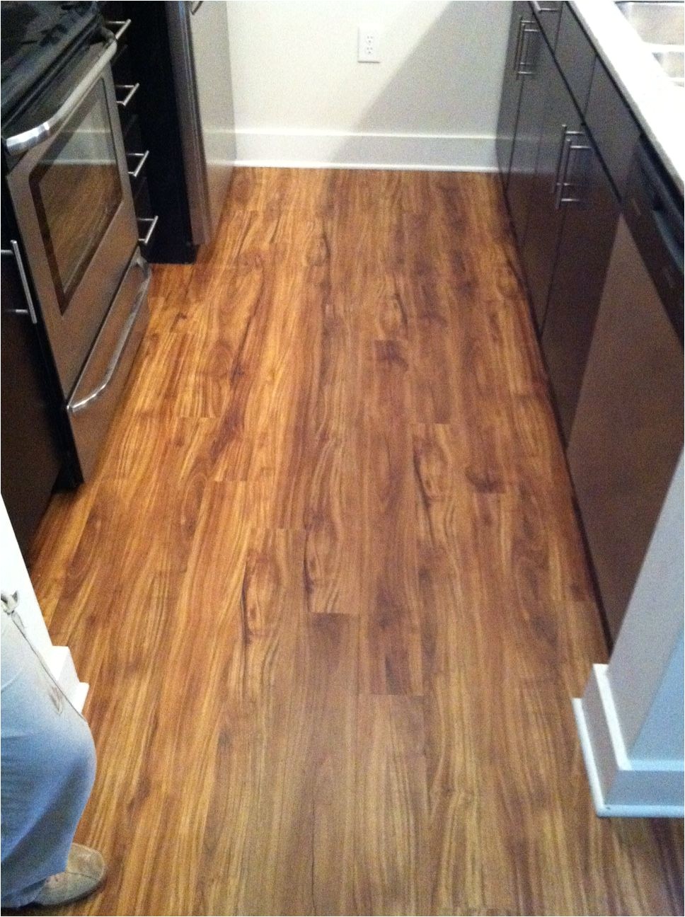gold coast acacia coretec flooring 100 waterproof 100 kid proof and 100 pet proof stop by and let us show you the cabinet shade tree oviedo