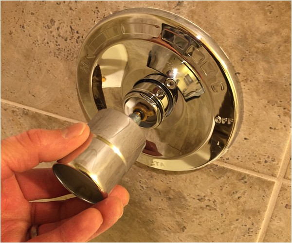 adjust moen shower valve for hot water