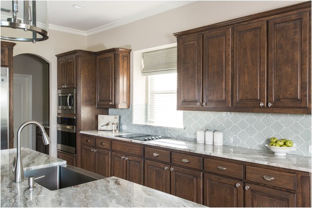 brown fantasy dark cabinets backsplash ideas