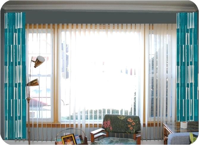 how to hang curtains over vertical blinds without drilling