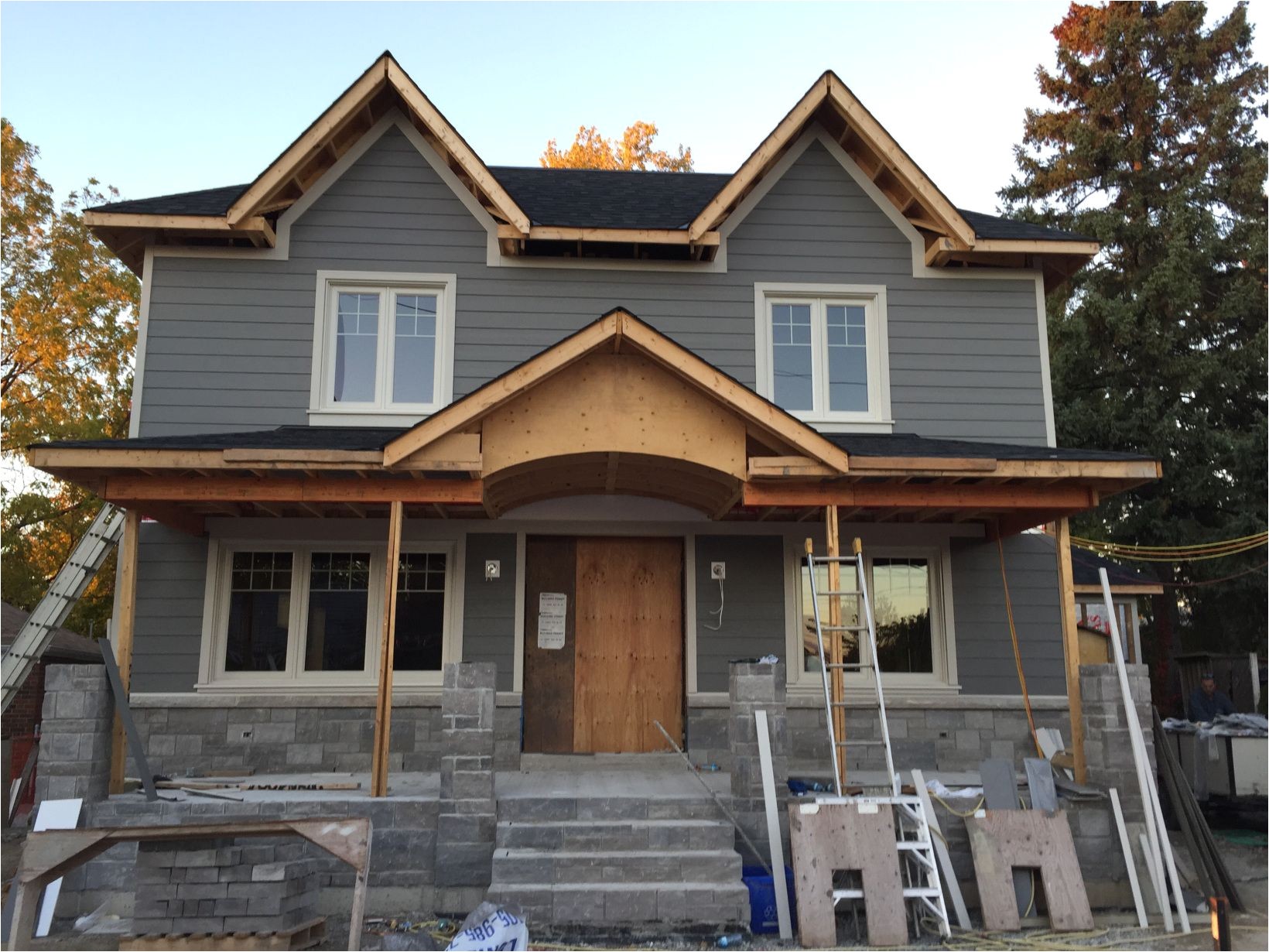 the siding is james hardie cement fiberboard in a colour called aged pewter the trim colour is cobblestone