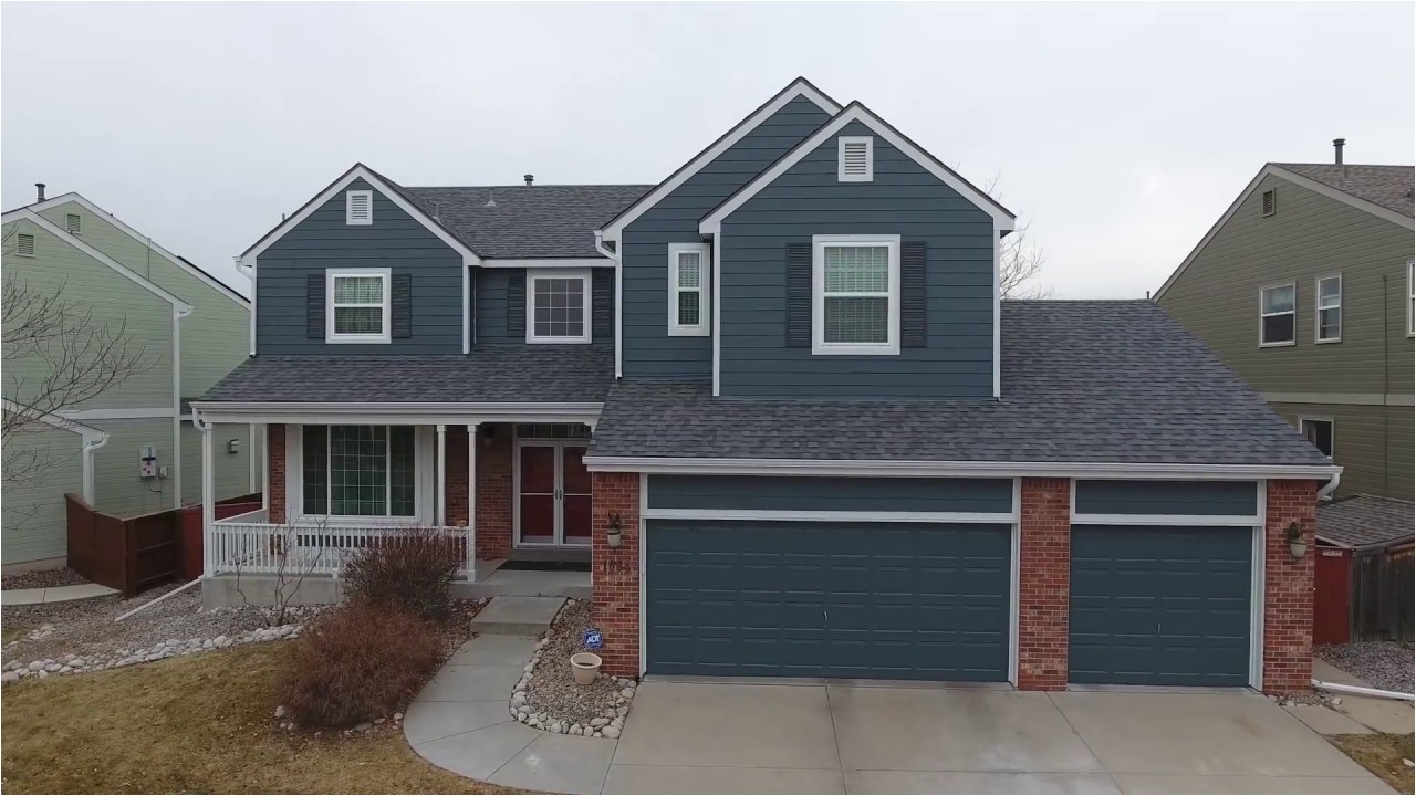 james hardie evening blue siding with iron gray shutters