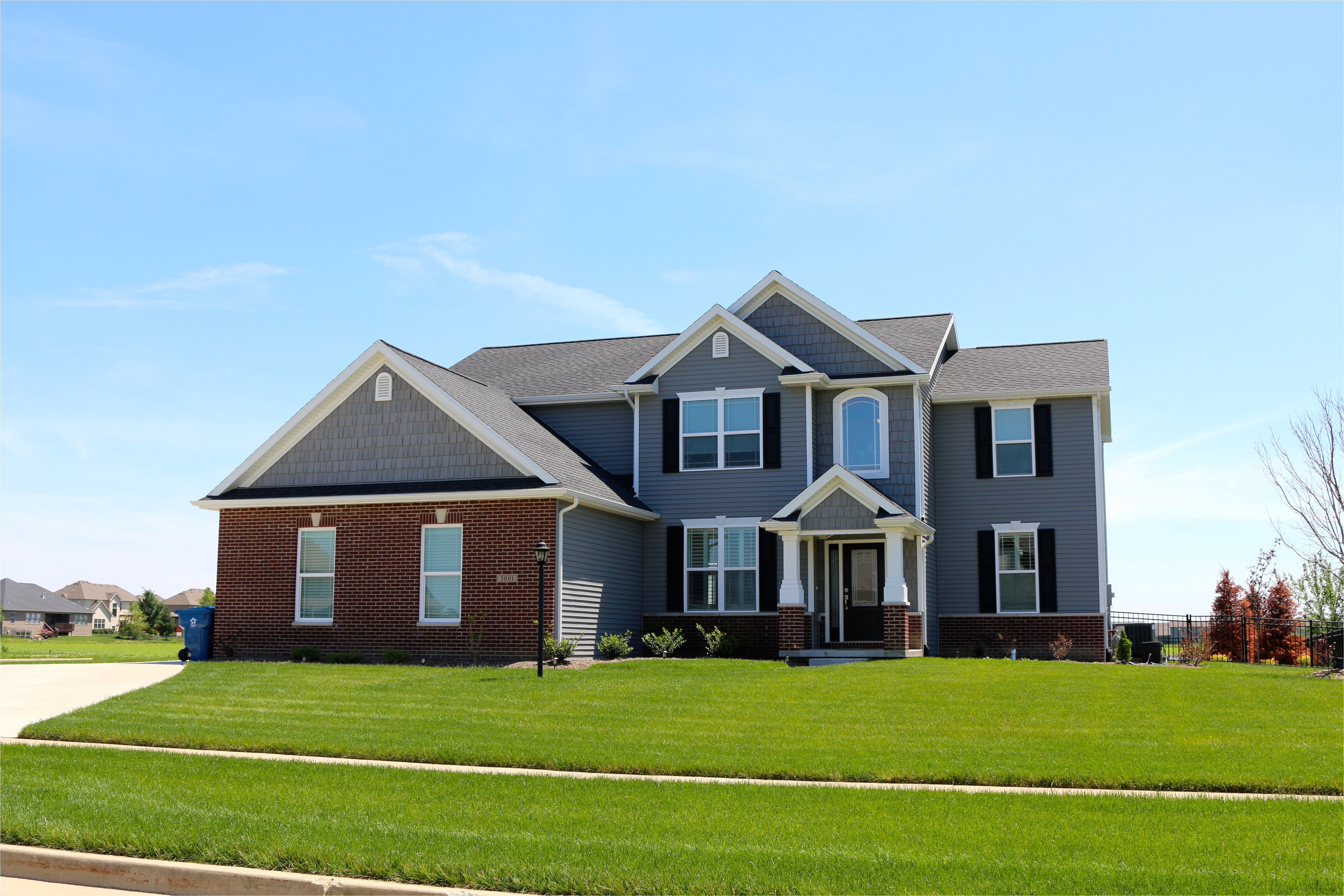 moire black roof with white trim mastic ovation deep granite siding and shakes