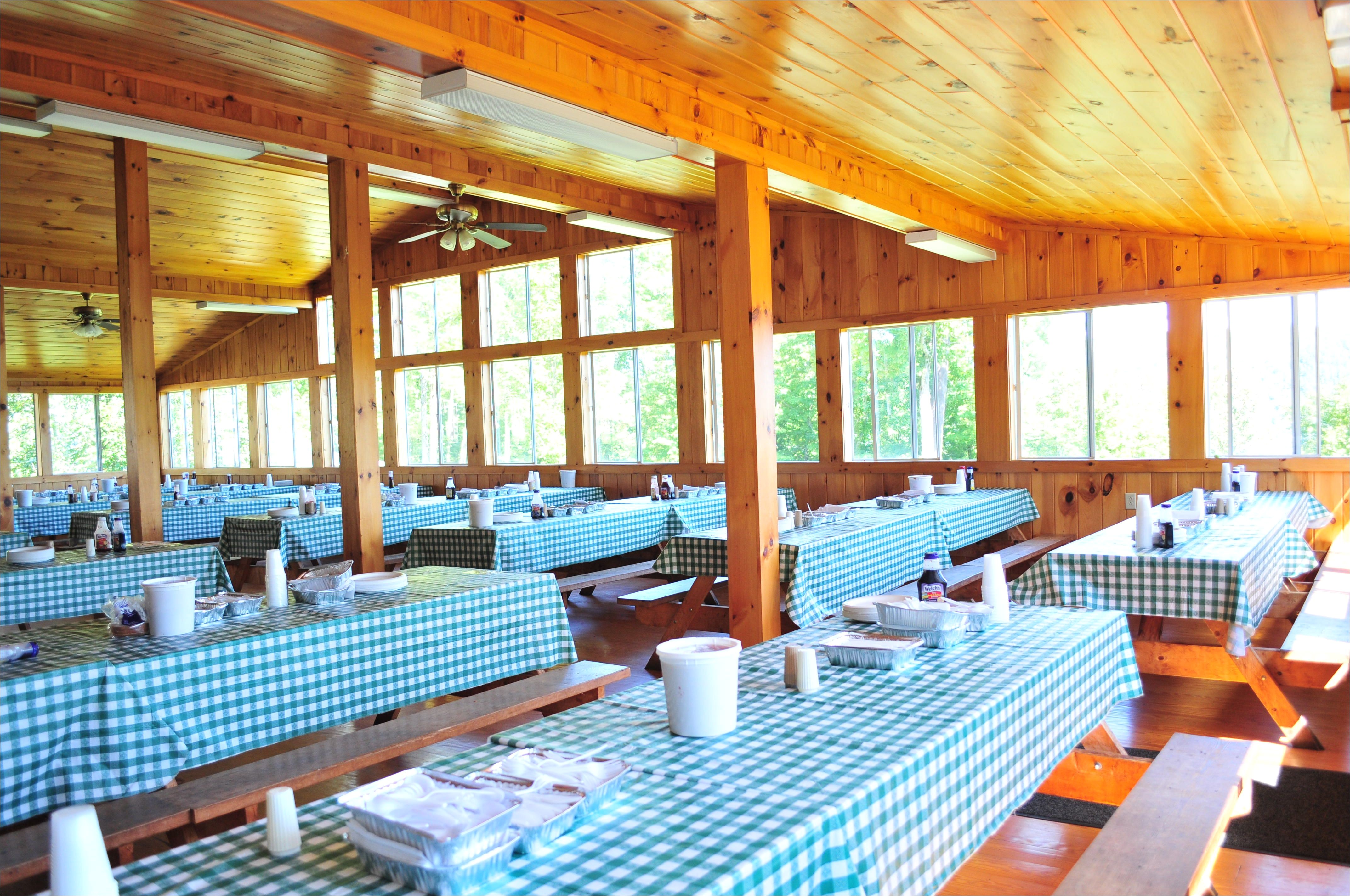 main dining hall at camp southwoods big space bright lighting amazing views of paradox lake ny