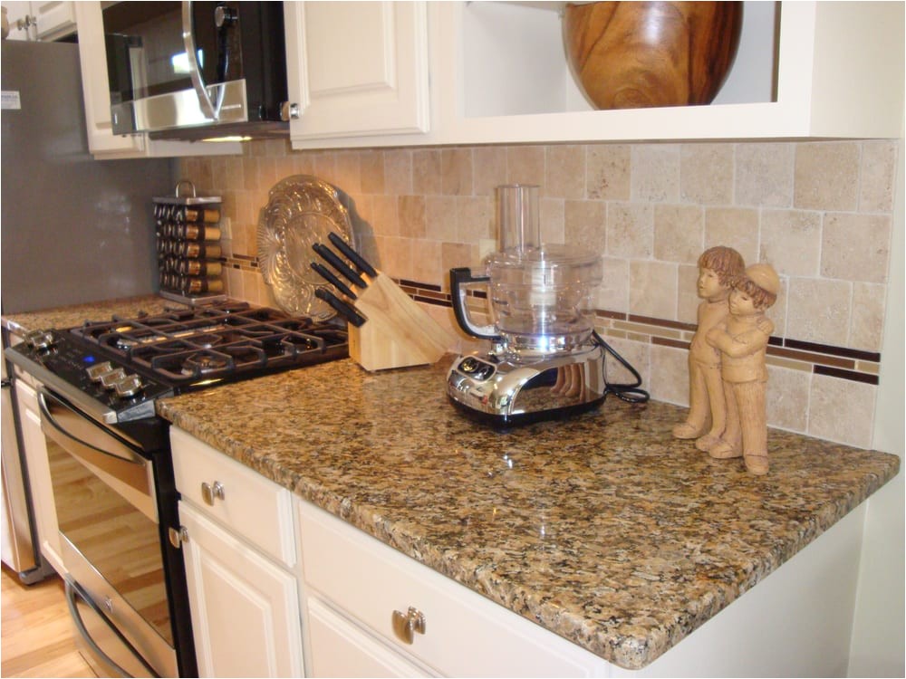 New Venetian Gold Granite with Glass Tile Backsplash New Venetian Gold Granite with Travertine Tile Backsplash