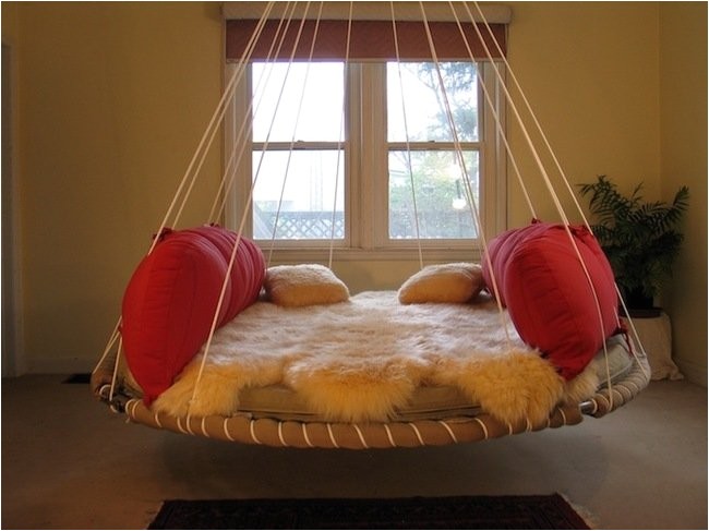 how to repurpose your old trampoline into a swing bed