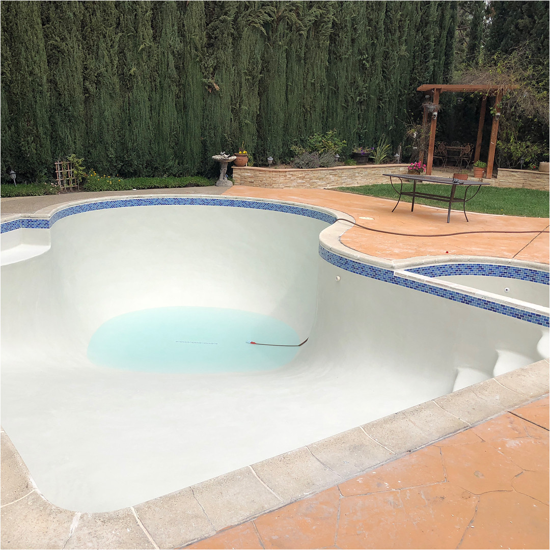 white plaster 1x2 glass tile poolprossj tile poolside skimmer