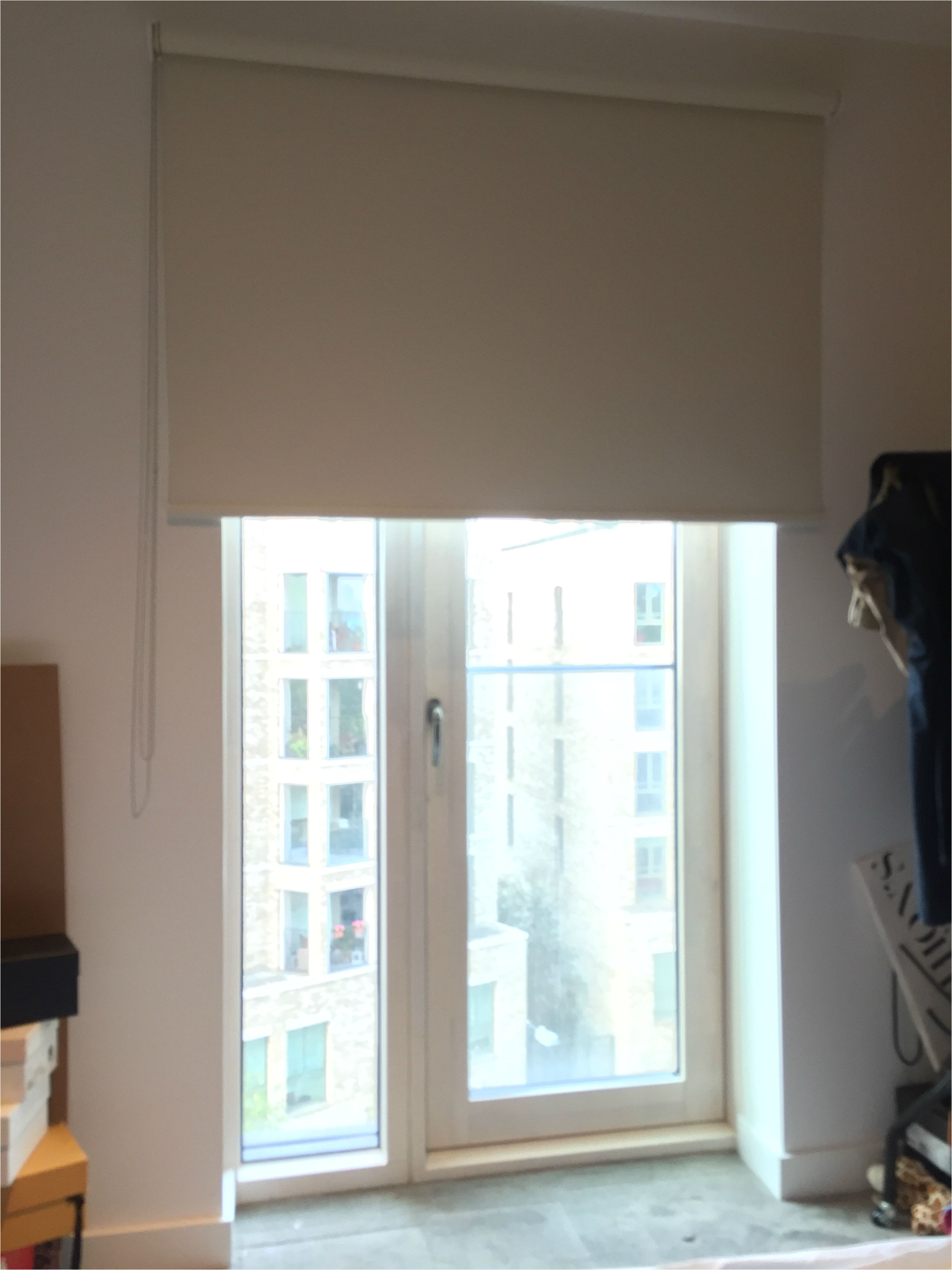 blackout roller blind fitted to french door to apartment in elephant castle london made to measure modern blinds blinds for doors outside recess