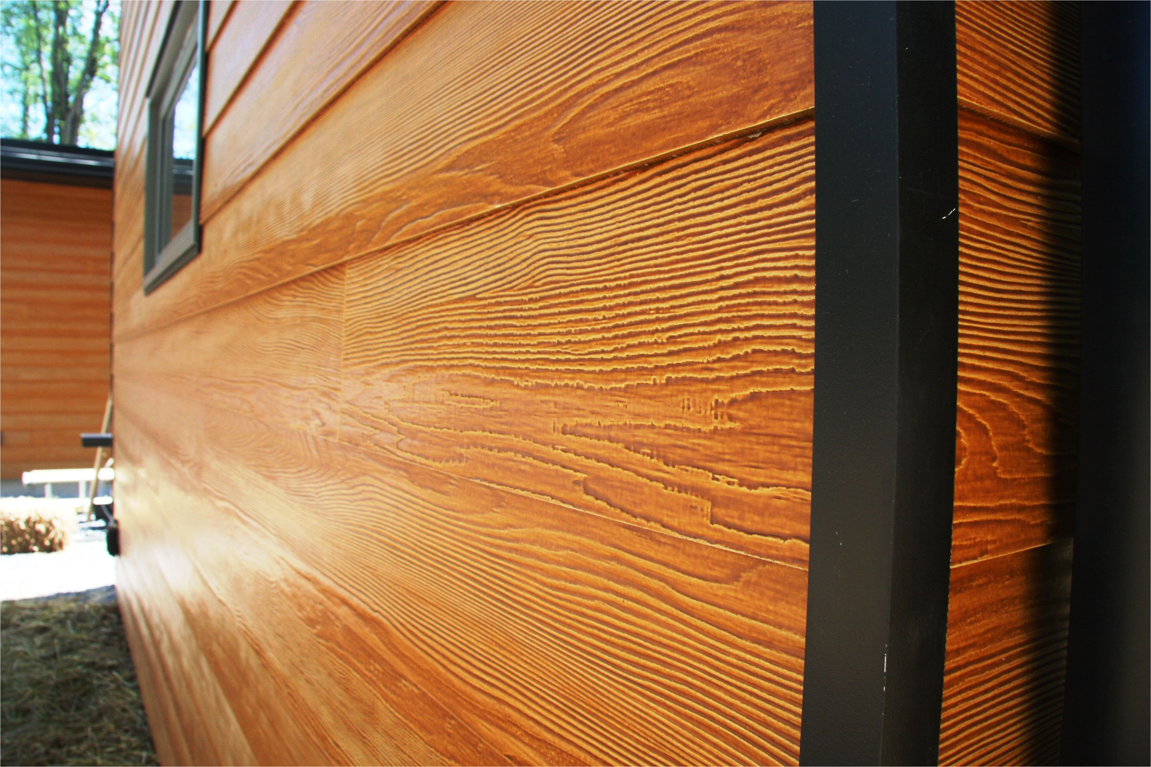 certainteed fiber cement siding closeup view cedar or maple stain source doesn t list finish