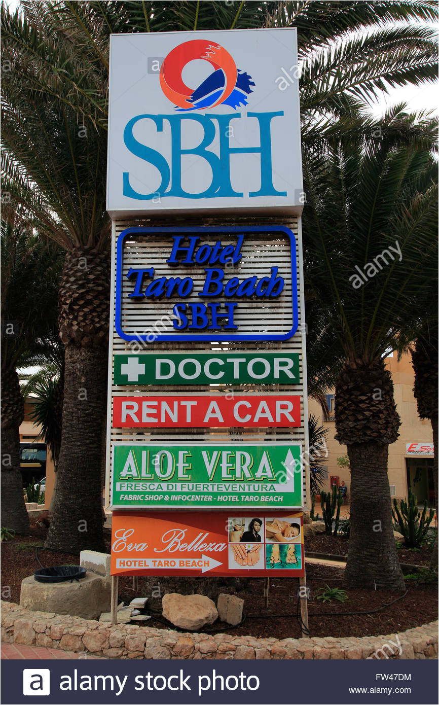 tourism services signs at costa calma resort fuerteventura canary islands spain stock