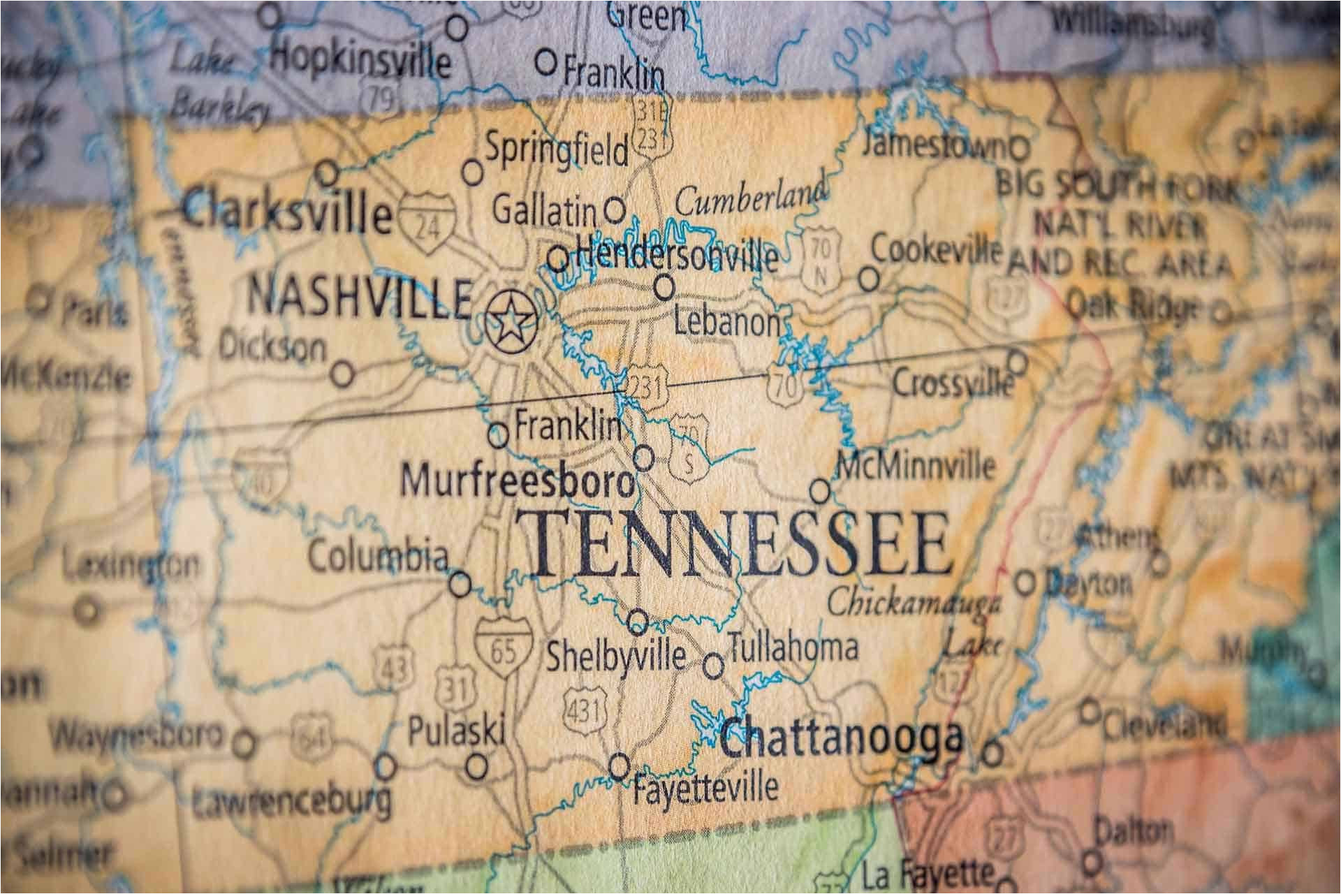 closeup selective focus of tennessee state on a geographical and political state map of the usa