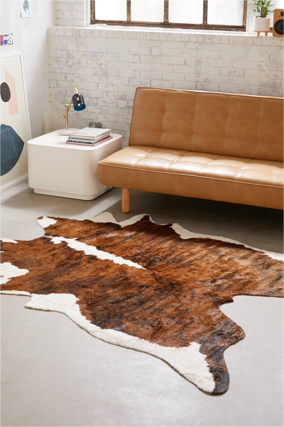 shaped faux animal hide rug urban outfitters