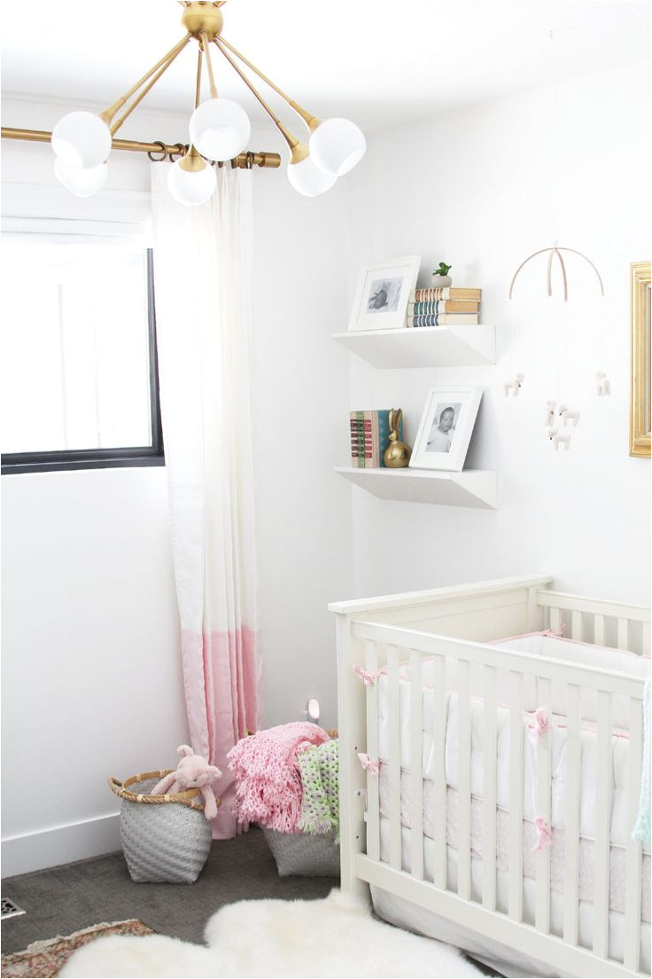 pink nursery with pops of metallics crib bedding by serena lily image via