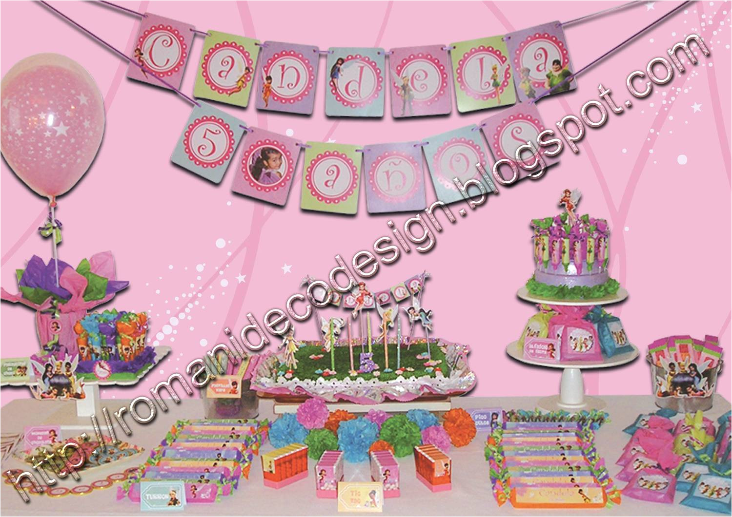 en la guirnalda en los souvenirs en los centro de mesa con globos y en la torta el resultado un cumple muy colorido en tonos bien femeninos