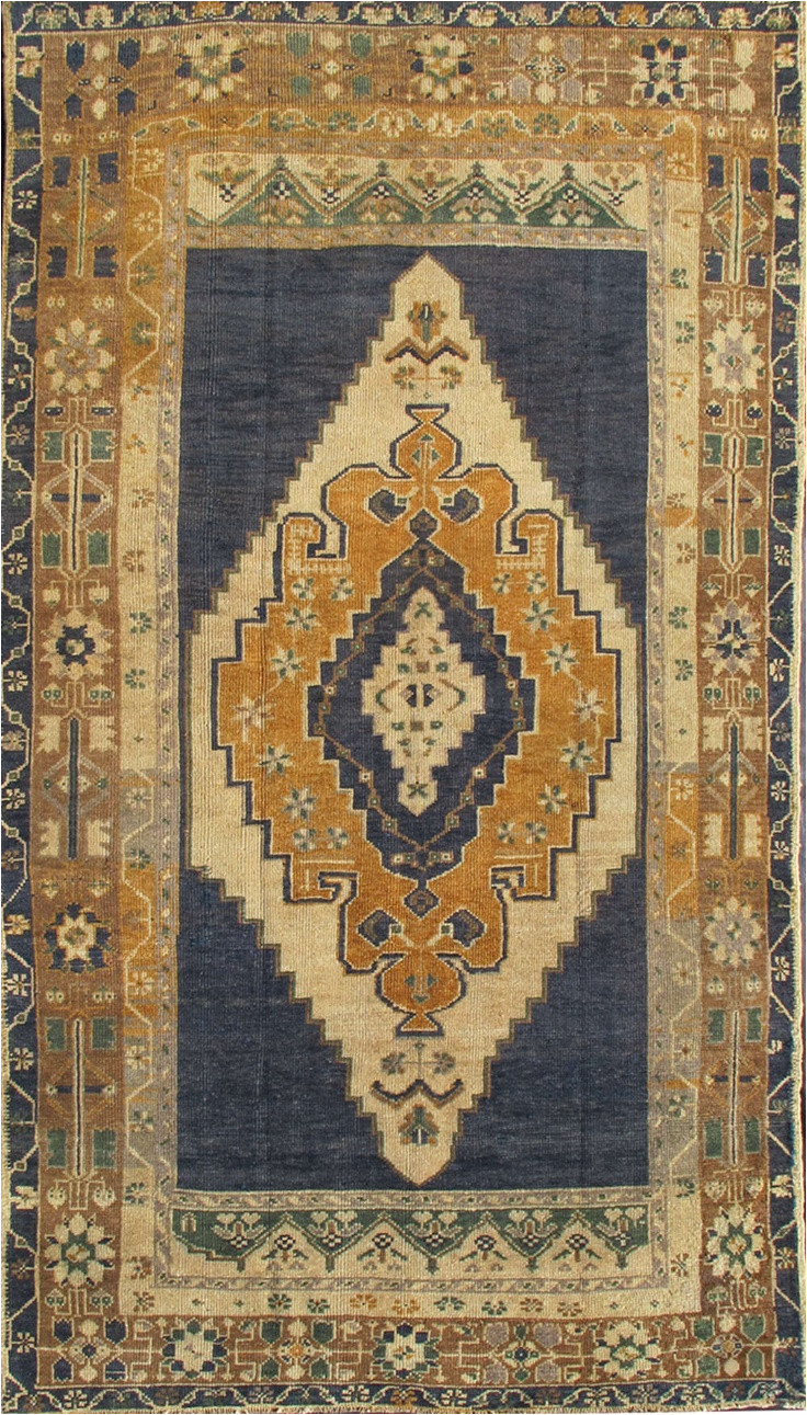 1940 gold and navy blue oushak wool rug from turkey handsome