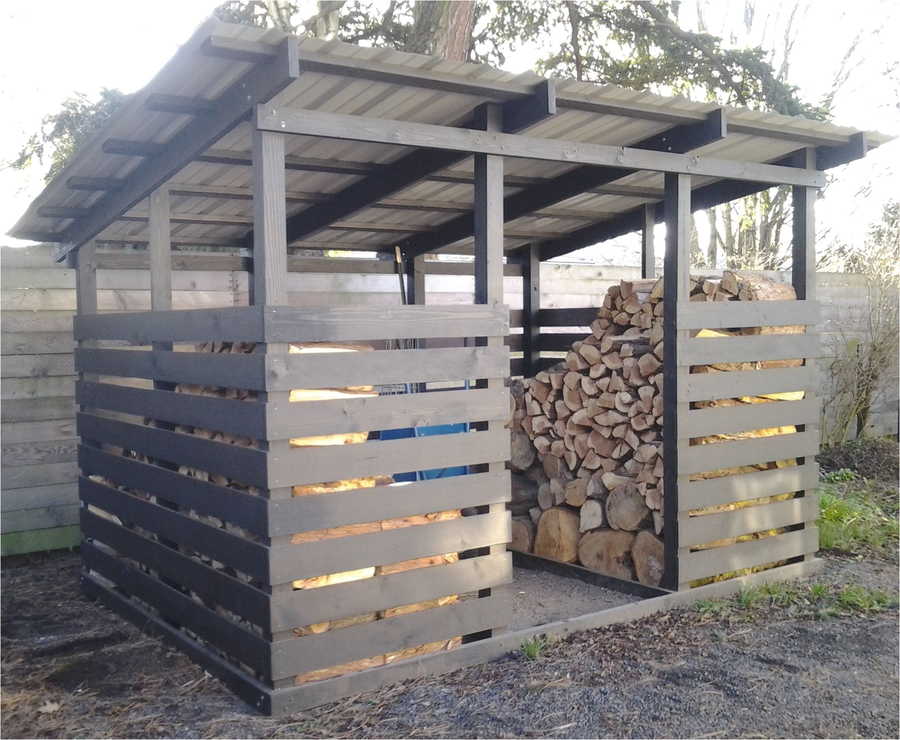 modern firewood shed black