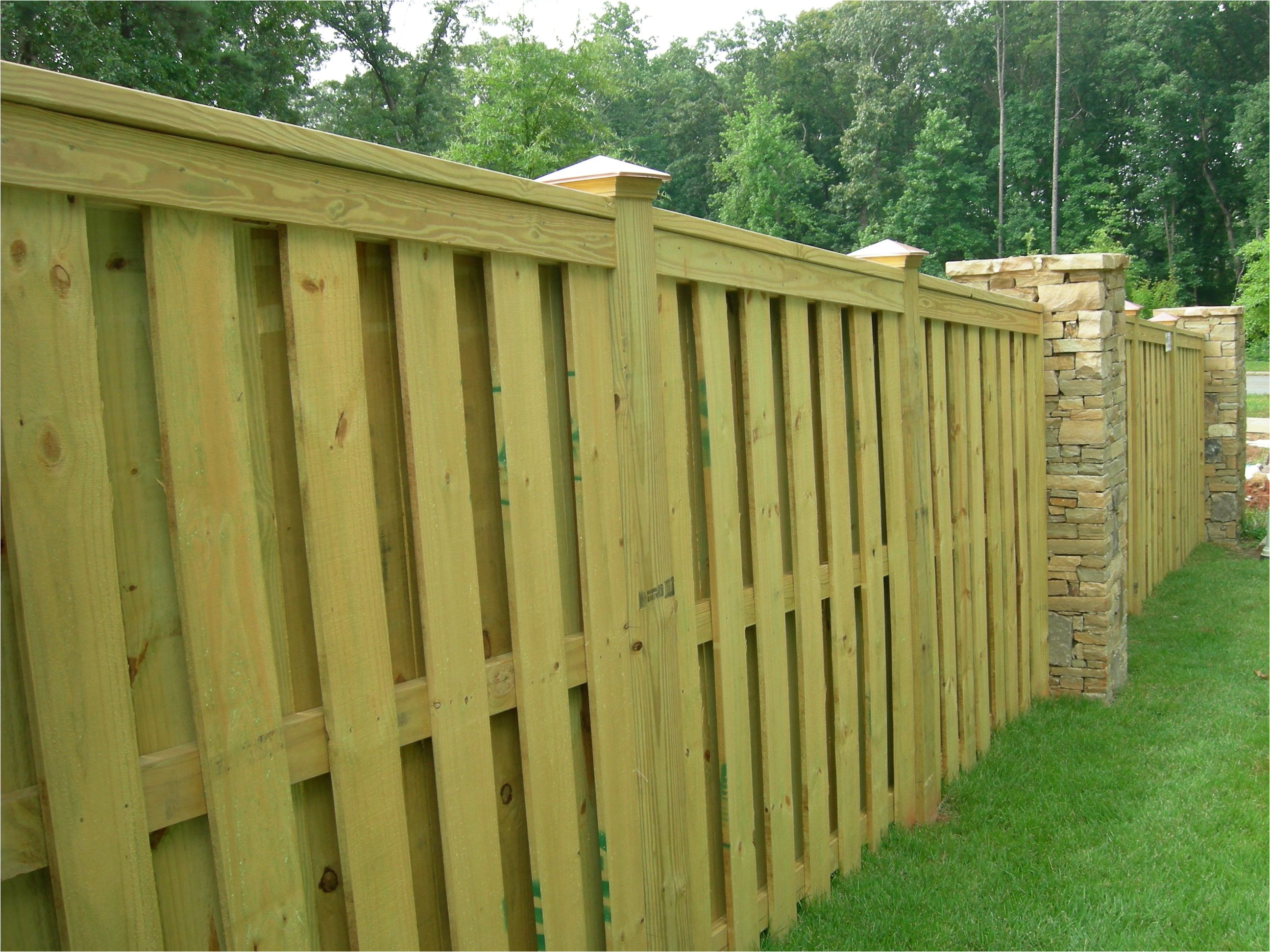 shadow box fence with trimmed top i am completely in love with this fence would like to have this without the brick to reduce costs