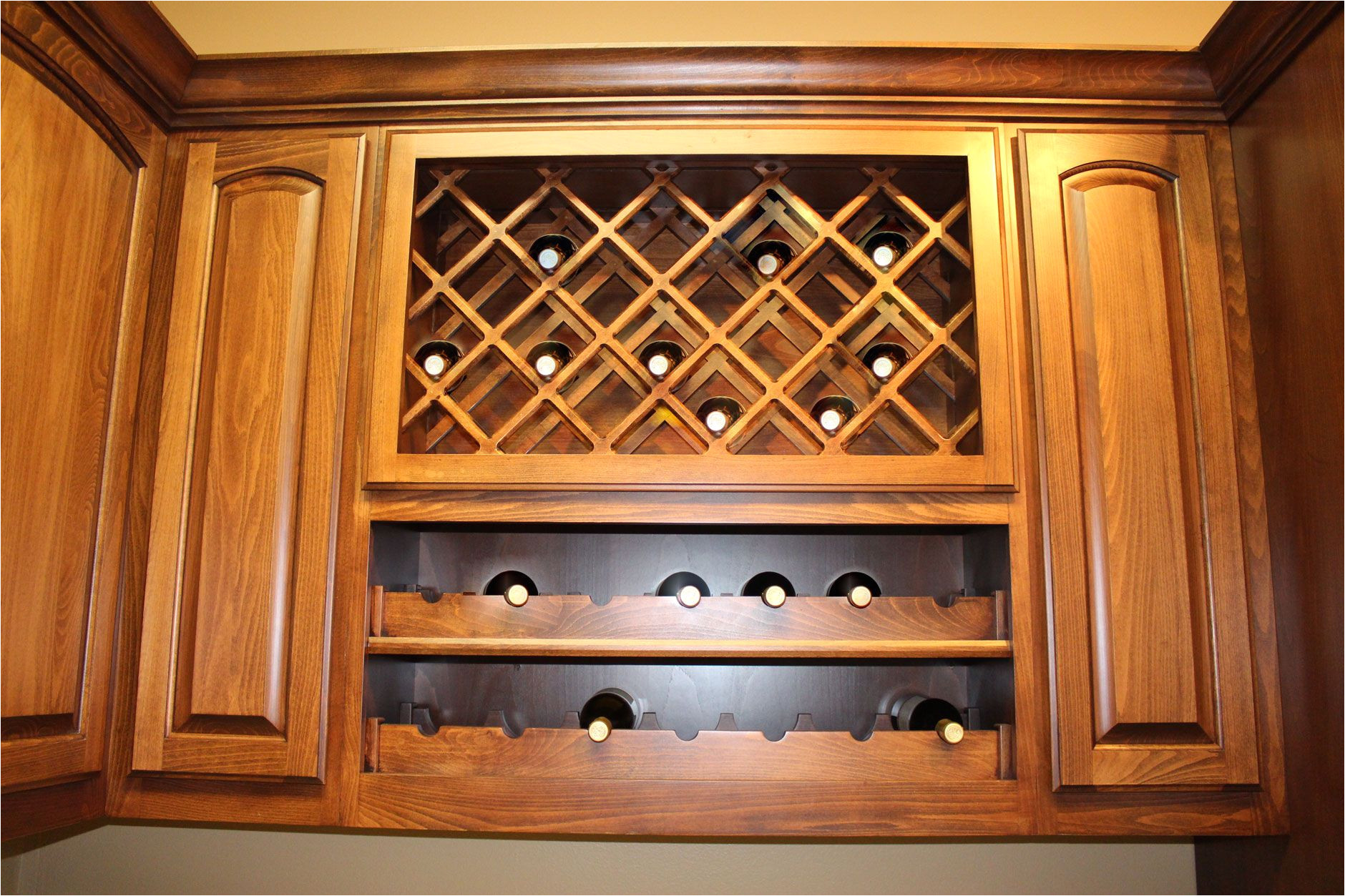 kitchen wine rack with lattice wine rack over scalloped wine rack by burrows cabinets burrowscabinets com