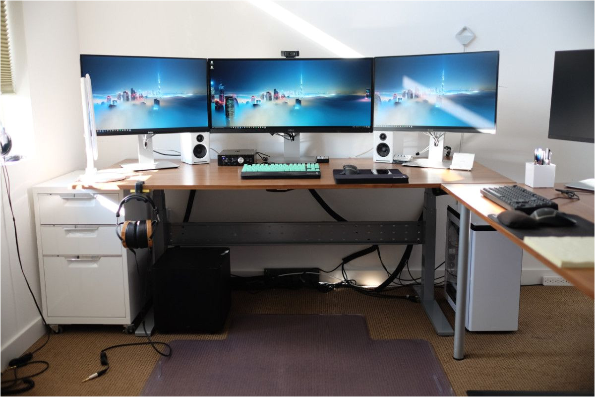 ikea gaming computer desk setup with drawer also triple monitors and white pc case battle station