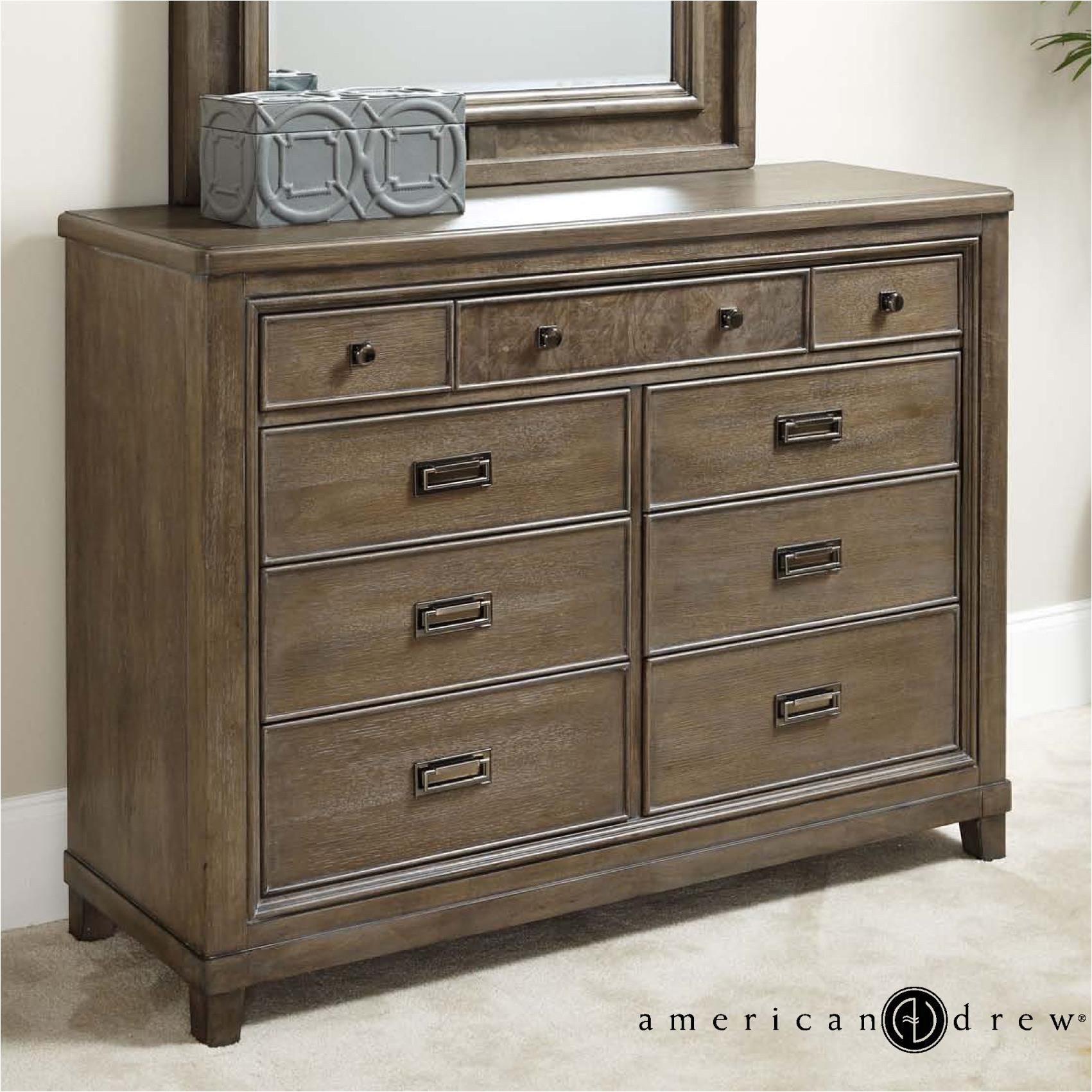 contemporary 9 drawer dresser with drop top center drawer with media storage