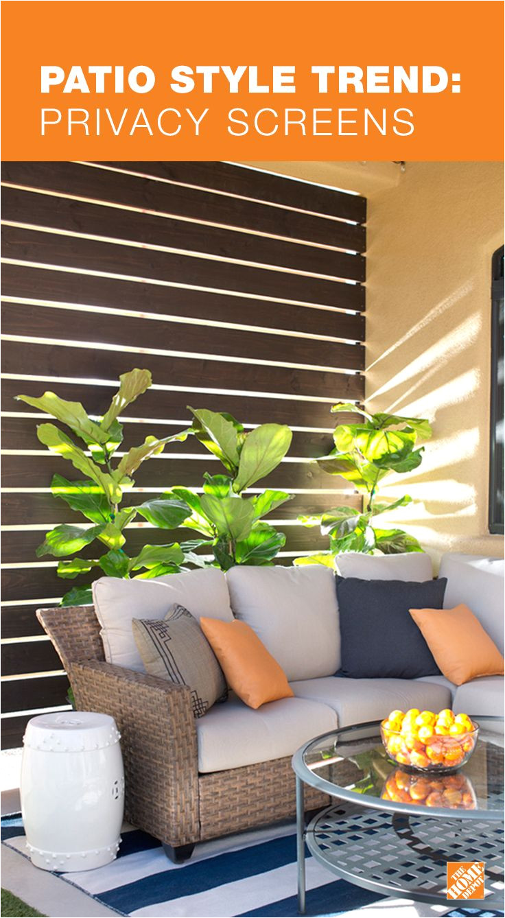 make your patio or porch feel more like a room with a privacy screen this diy slatted privacy screen is both functional and beautiful giving the patio a