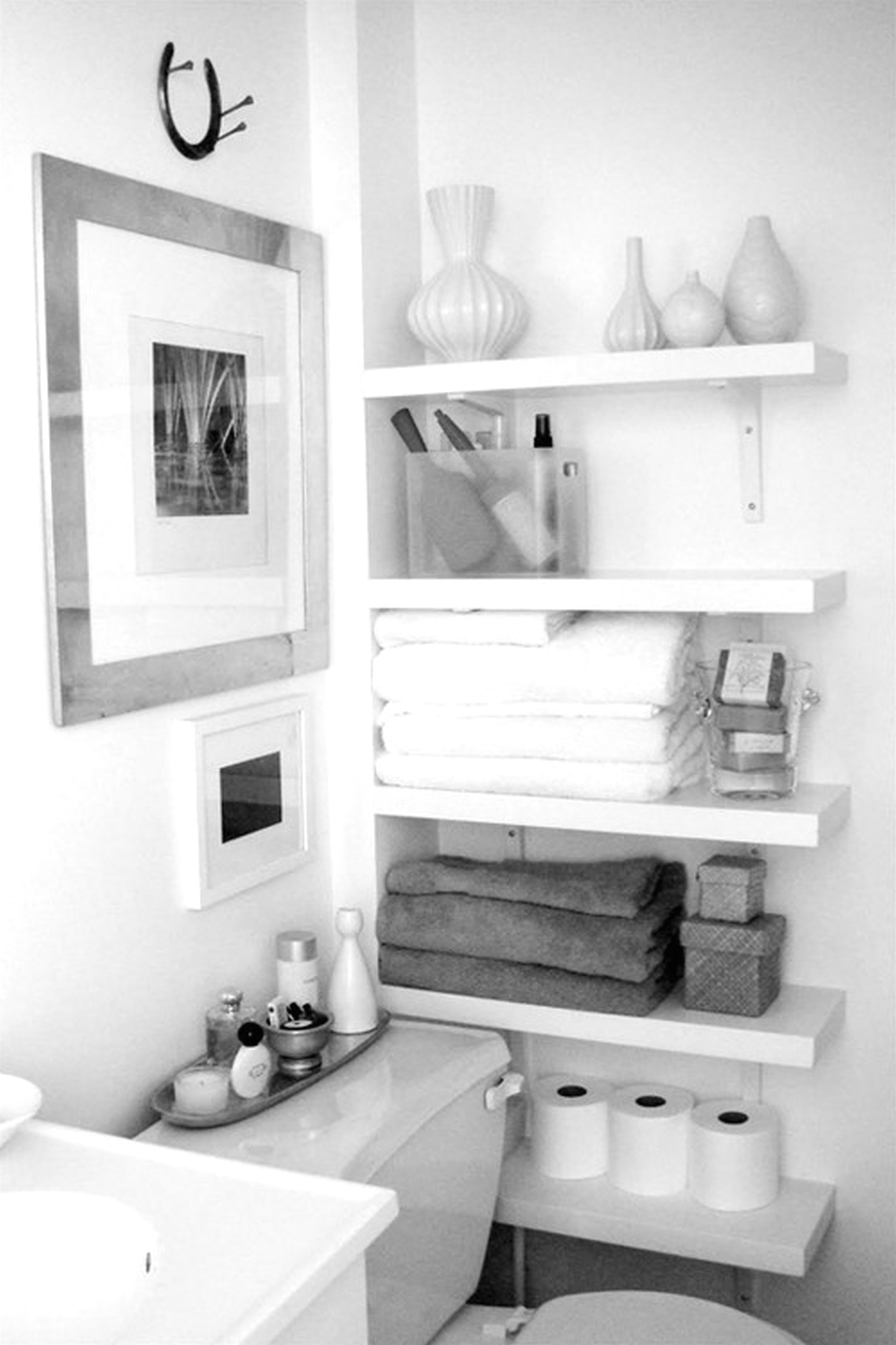 awesome white hardwood floating shelves as corner bathroom storage beside white toilet in half bathroom designs