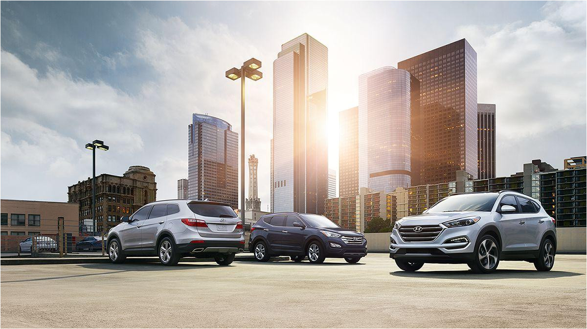 2016 hyundai model lineup parked in a downtown parking lot