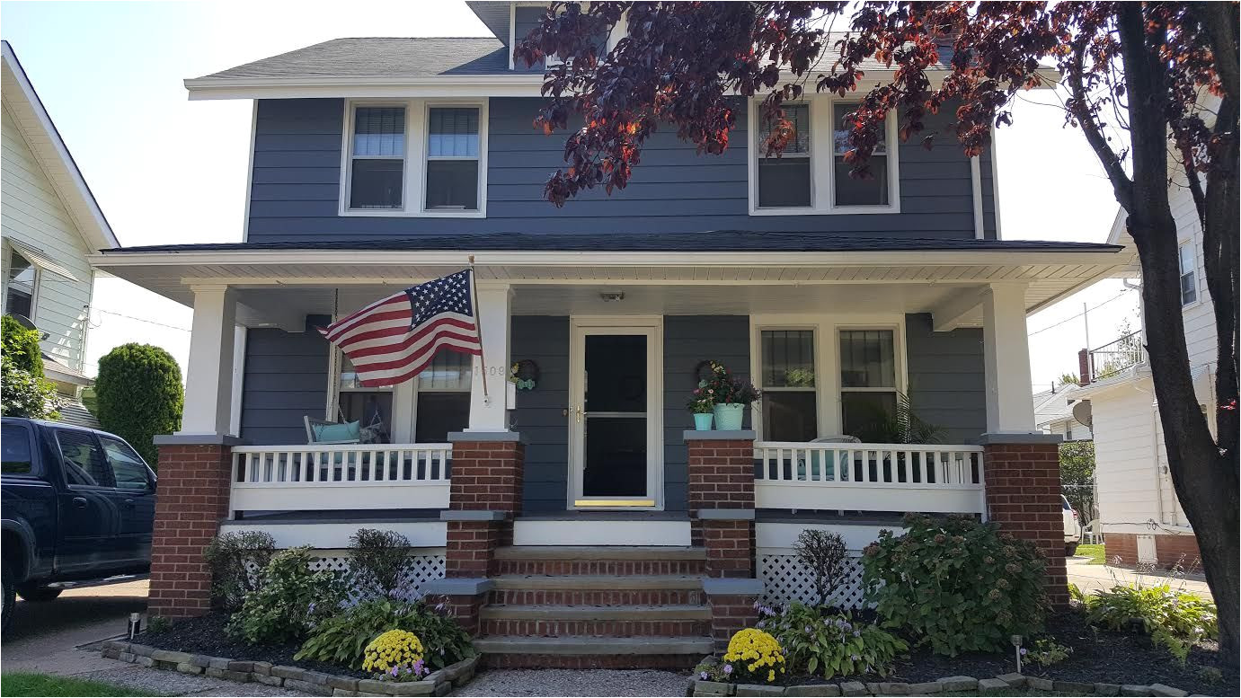 sherwin williams 7075 web gray much better than the faded white i have always thought the second story windows need shutters hmm what color shutters