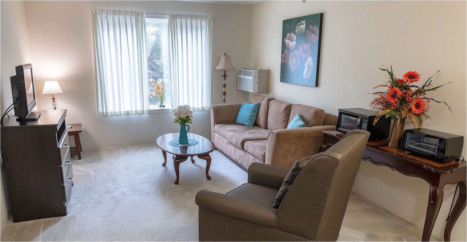 model apartment living room at jordan oaks independent senior living community