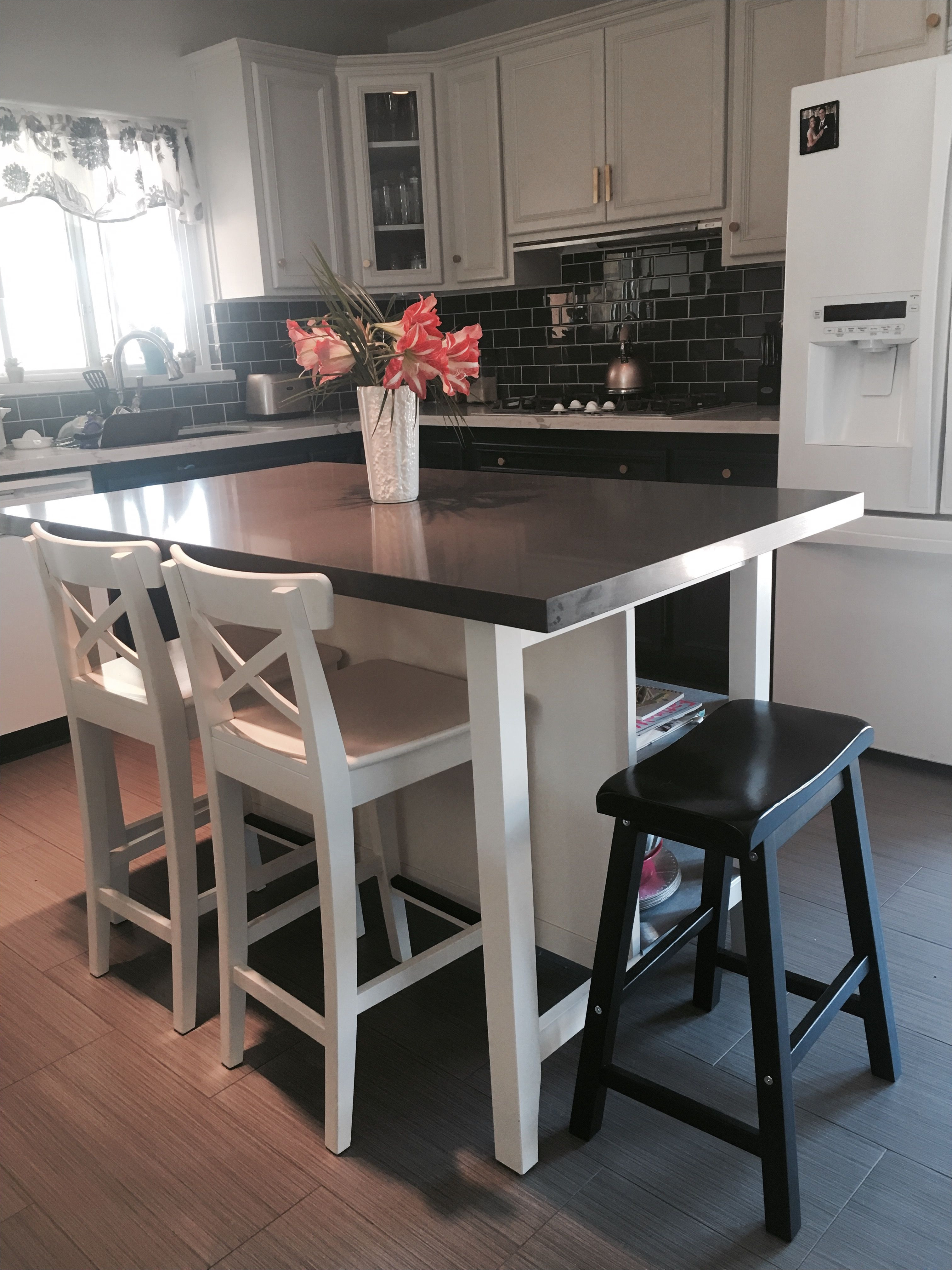 ikea stenstorp kitchen island hack here is another view of our ikea island we added grey quartz on top with more room to add a saddle bar stool