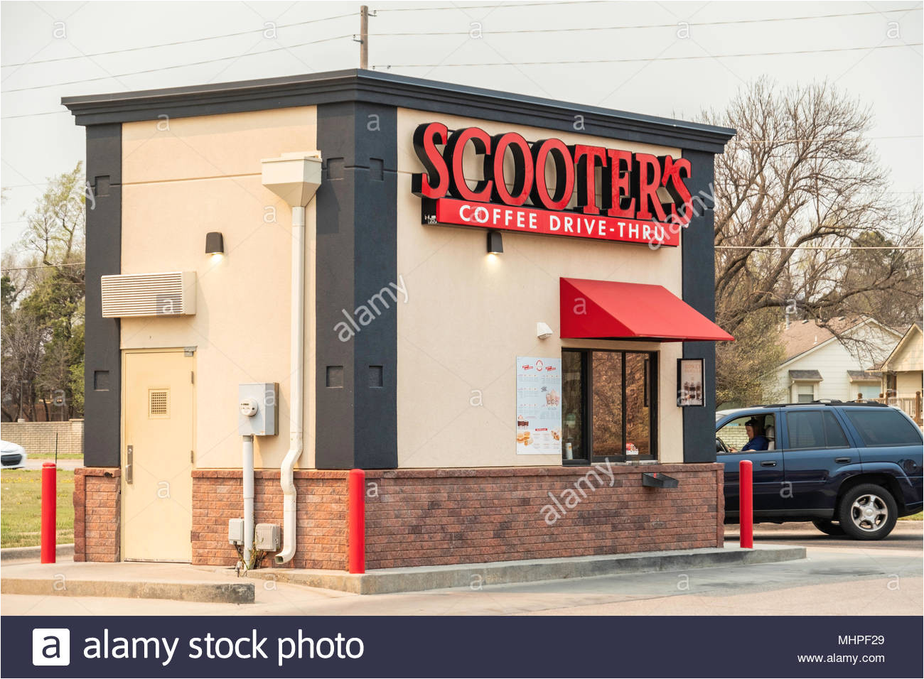 a female customer at scooter s coffee drive thru shop on maple avenue wichita