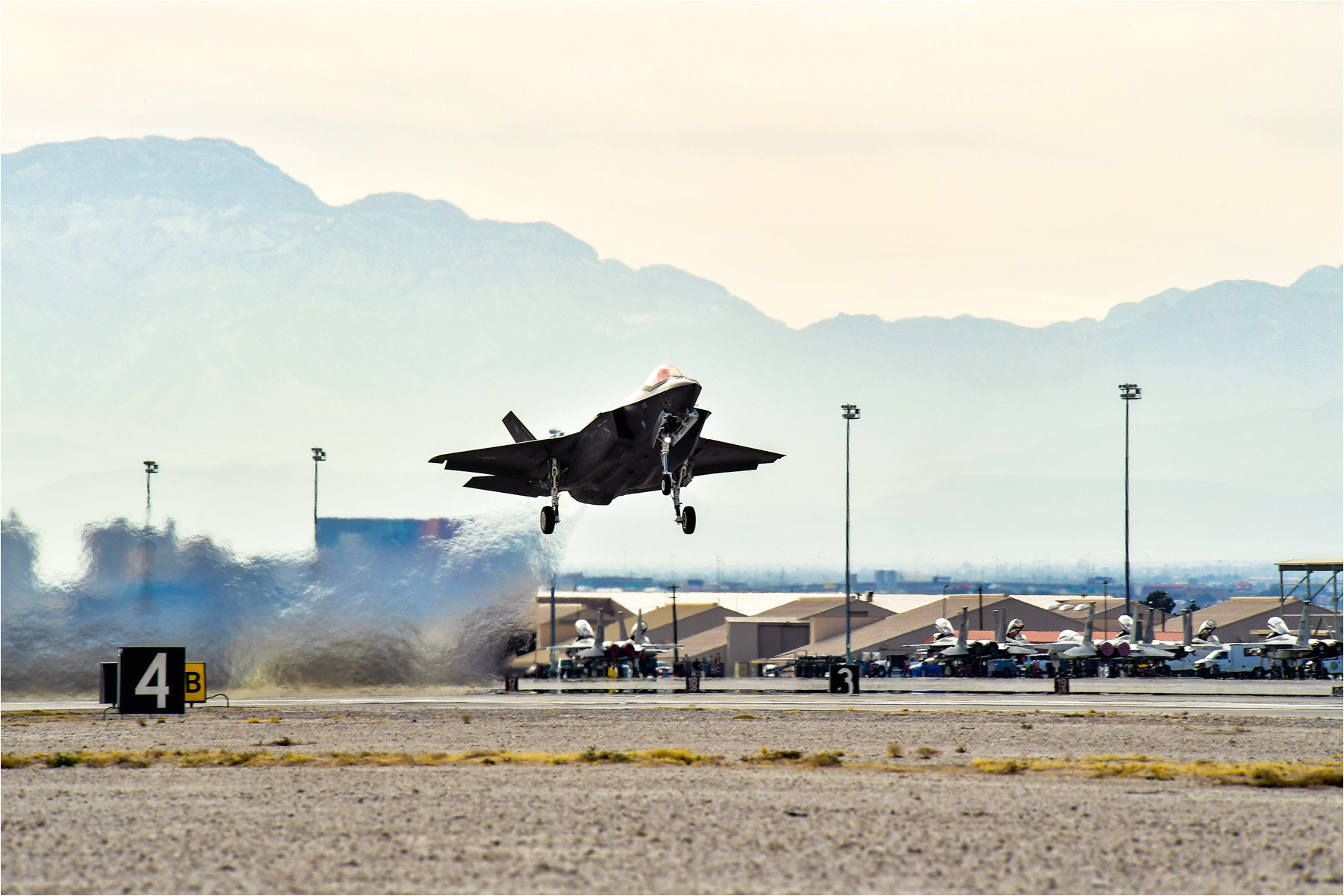 enlarge a jet lifts off from a runway