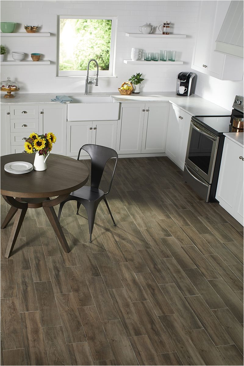 photo features evermore porcelain tile by daltile in sierra wood