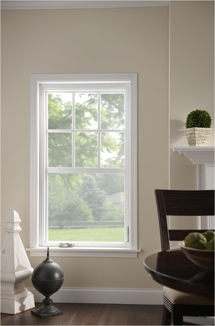 single hung window with grids increase natural lighting through a beautiful frame pair white