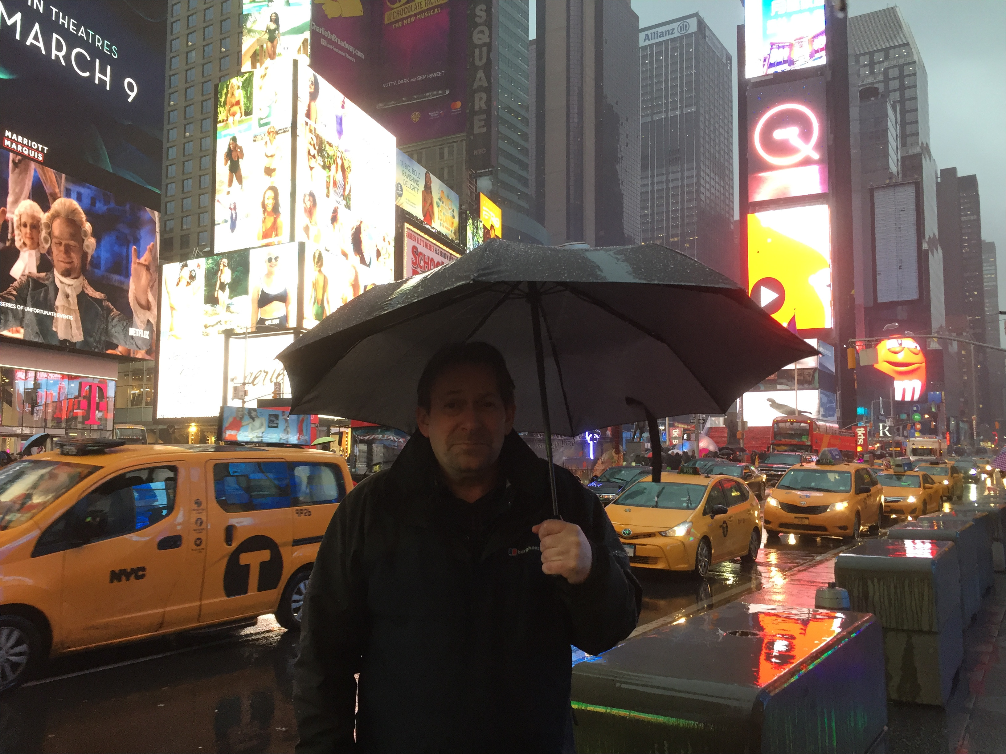 from left to right 1 with two of new york s finest 2 a rainy late afternoon in times square 3 at the 9 11 memorial world trade centre