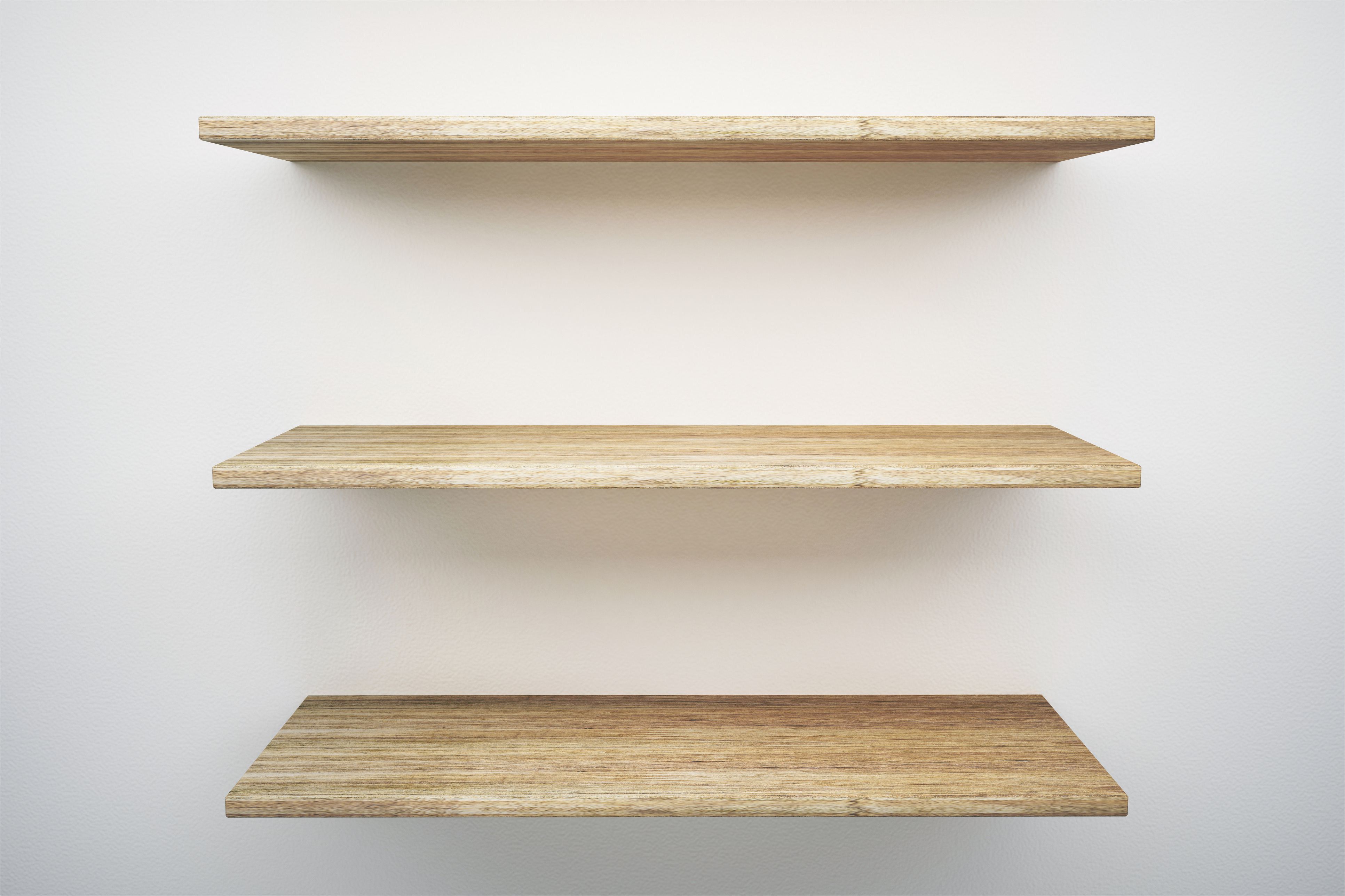 wooden shelves mounted on white wall 748563421 5a83c2aad8fdd50037f4d5dc jpg