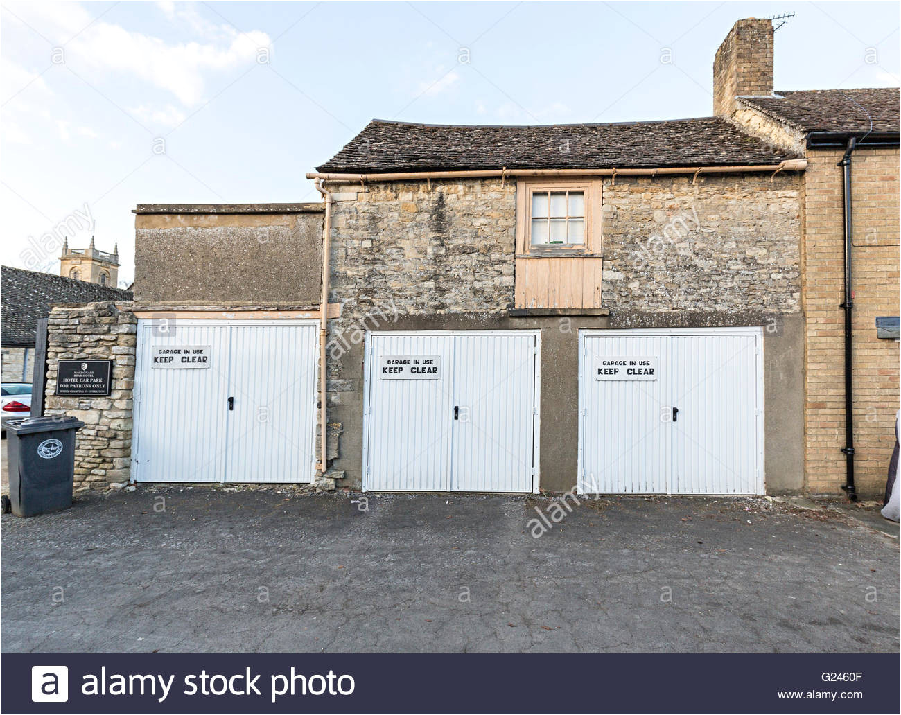 three garages with keep clear signs woodstock oxfordshire england uk stock