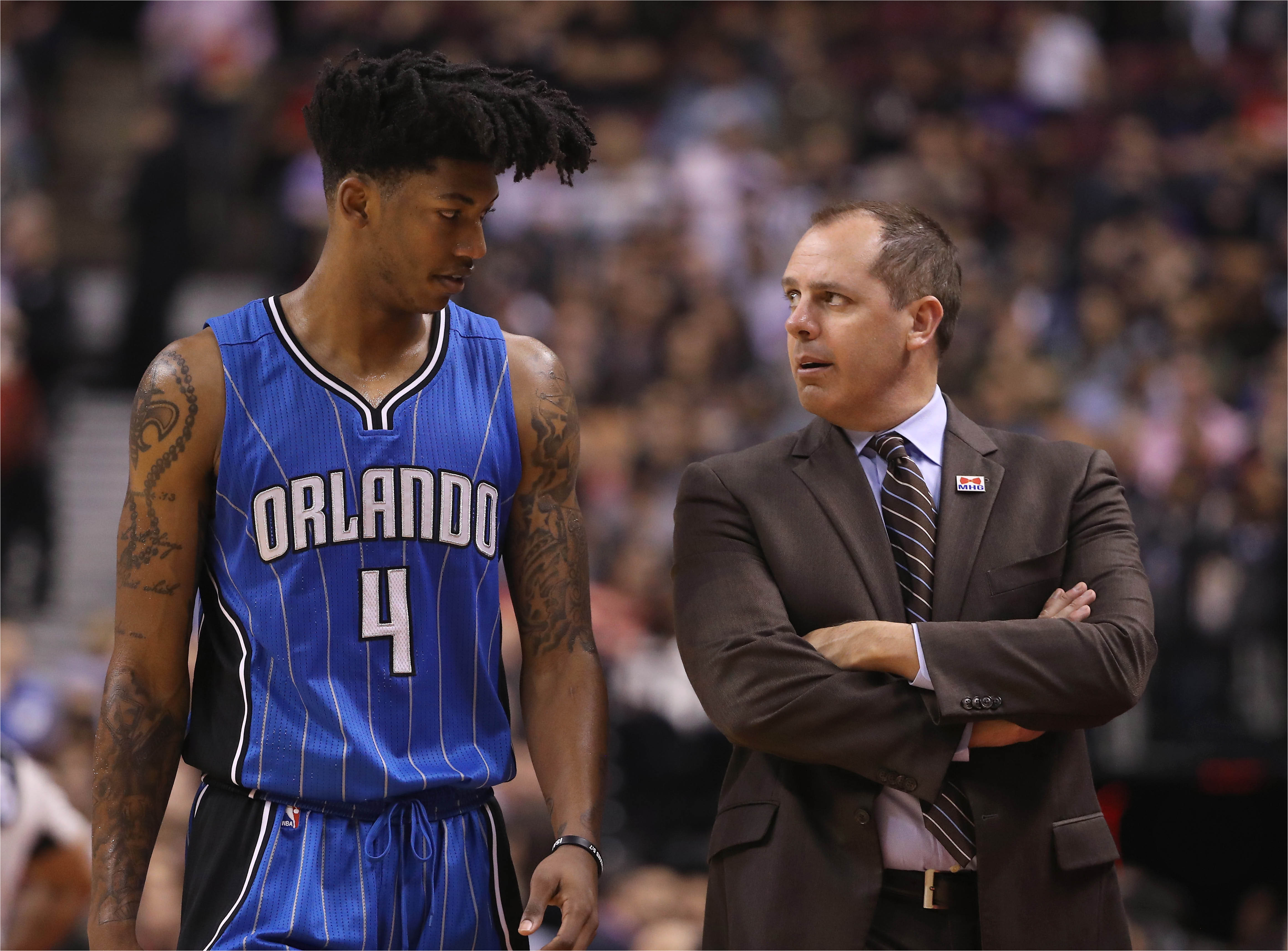 mar 27 2017 toronto ontario can orlando magic guard elfrid payton 4 talks to head coach frank vogel against the toronto raptors at air canada centre