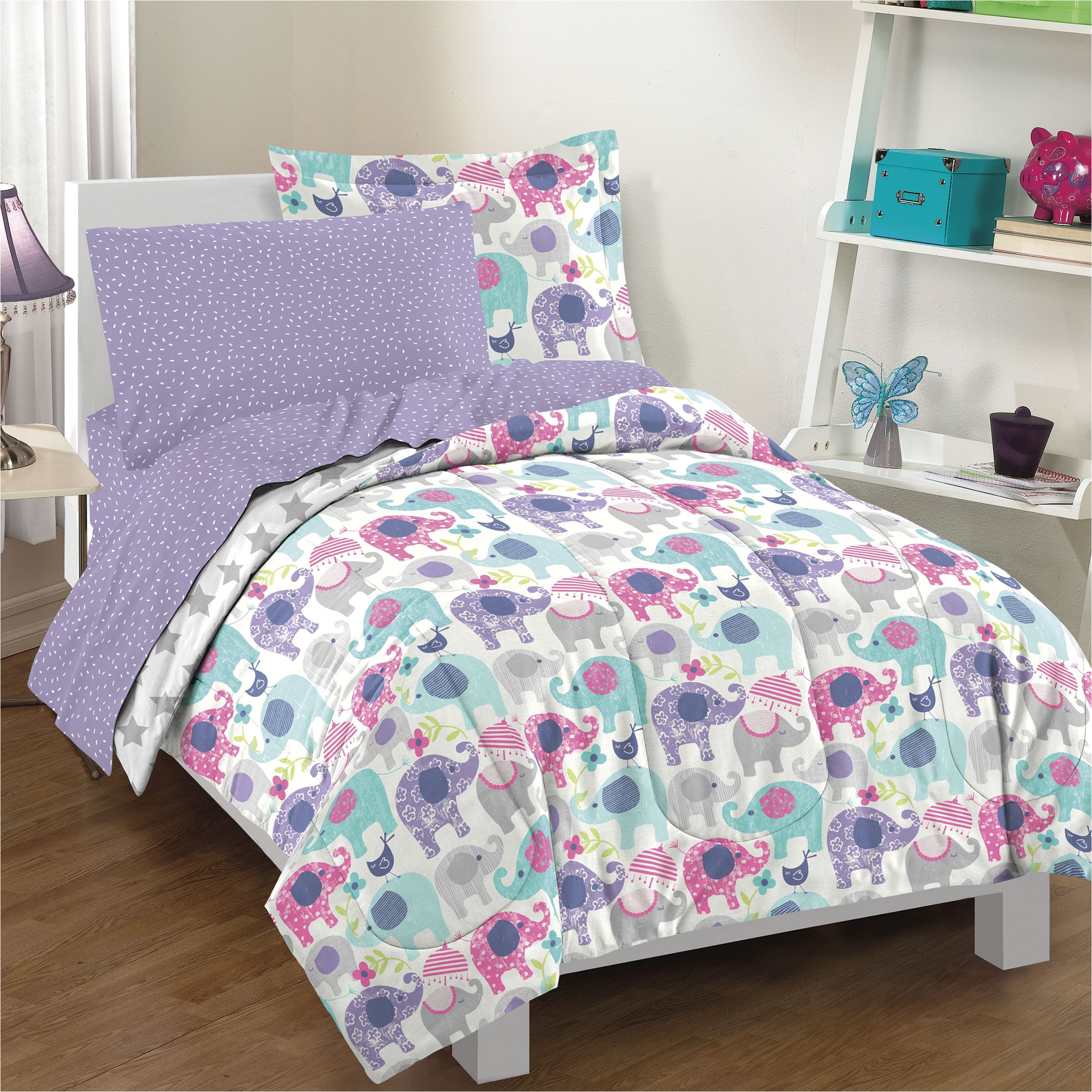 add a colorful splash to your room with this fun comforter set featuring adorable elephants crafted of a cotton polyester blend this set is conveniently