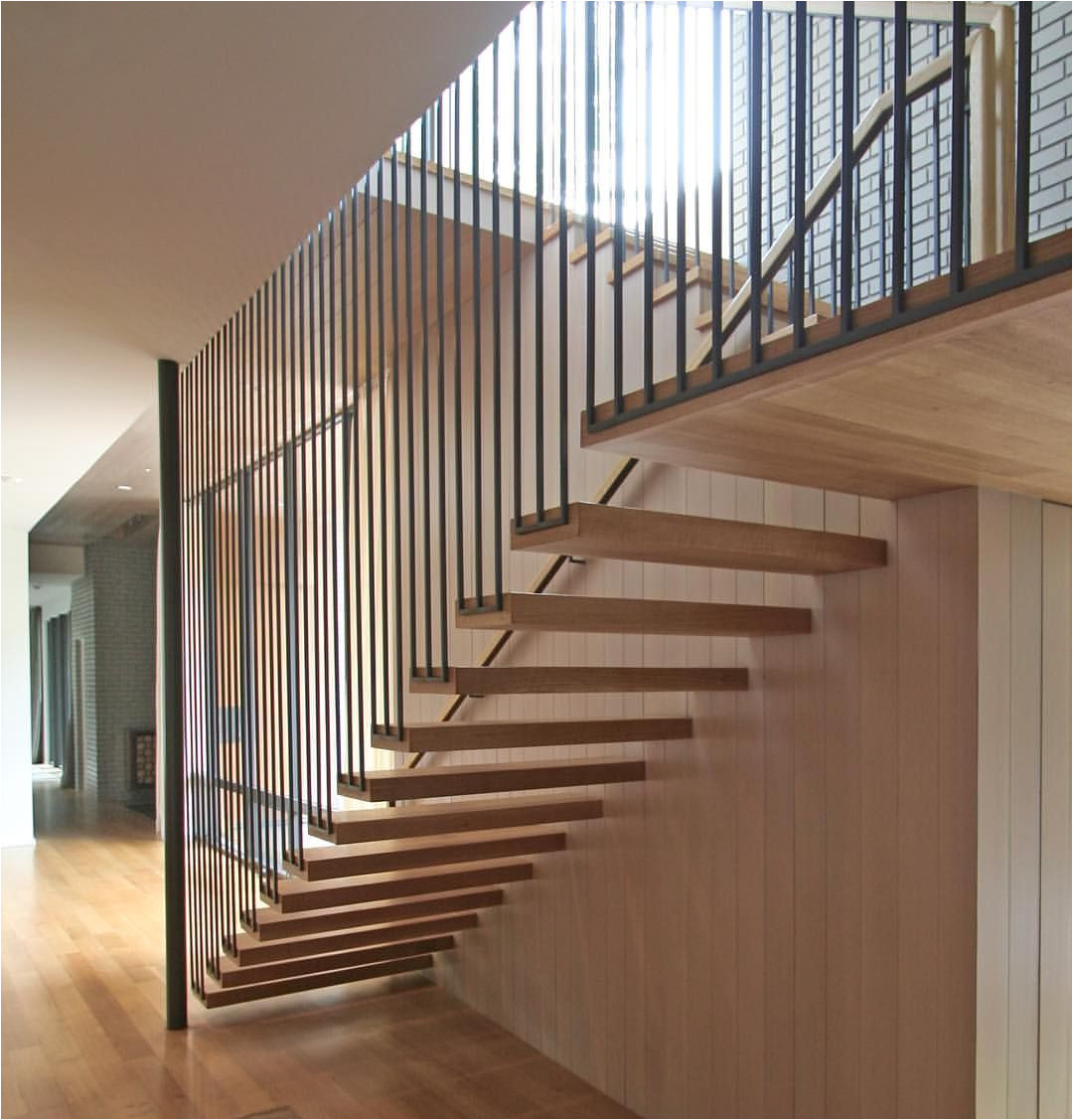 bluffview residence stair tensioned steel white oak via smitharcarchitects