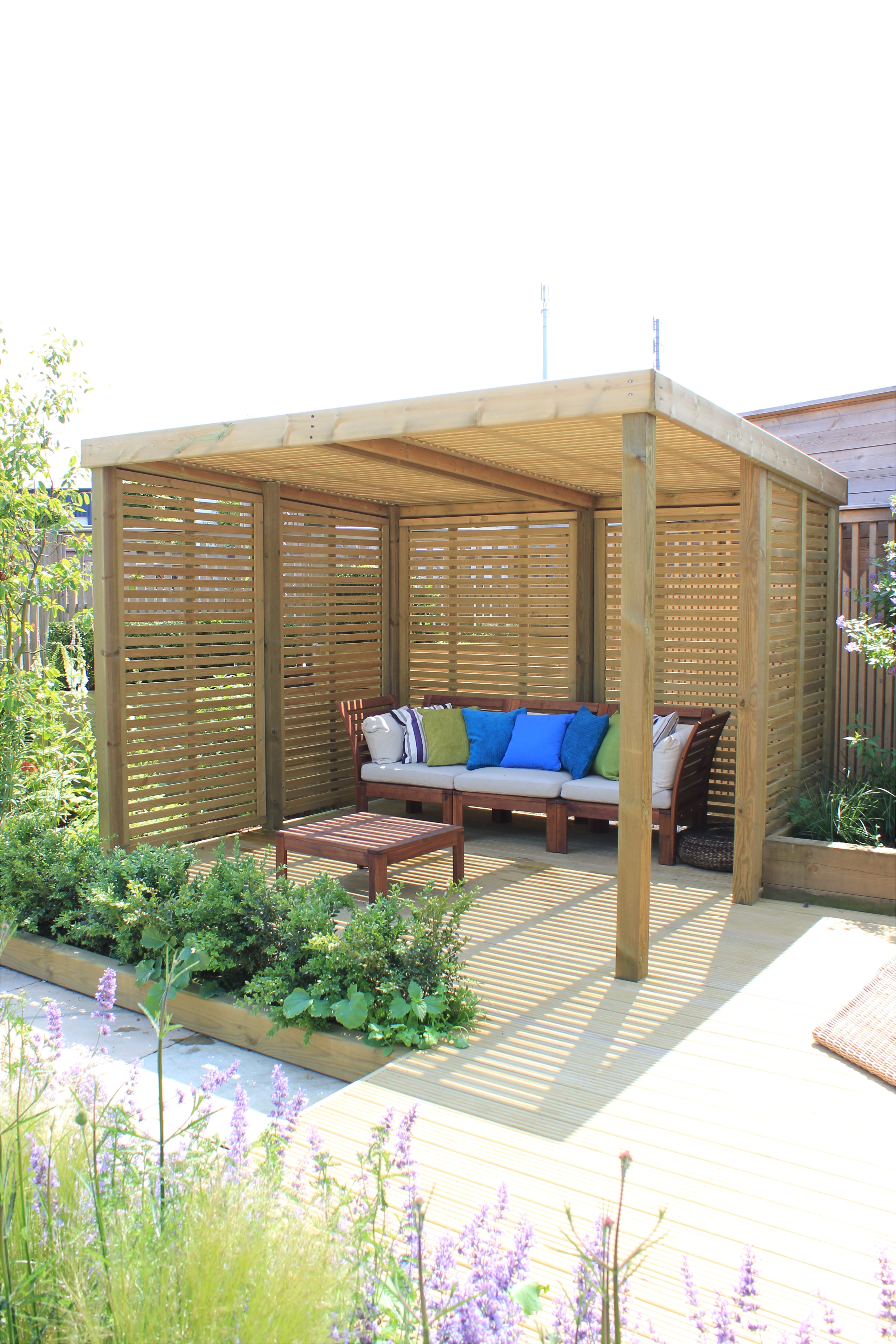 a contemporary garden shelter from jacksons fencing a timber structure with a 25 year guarantee