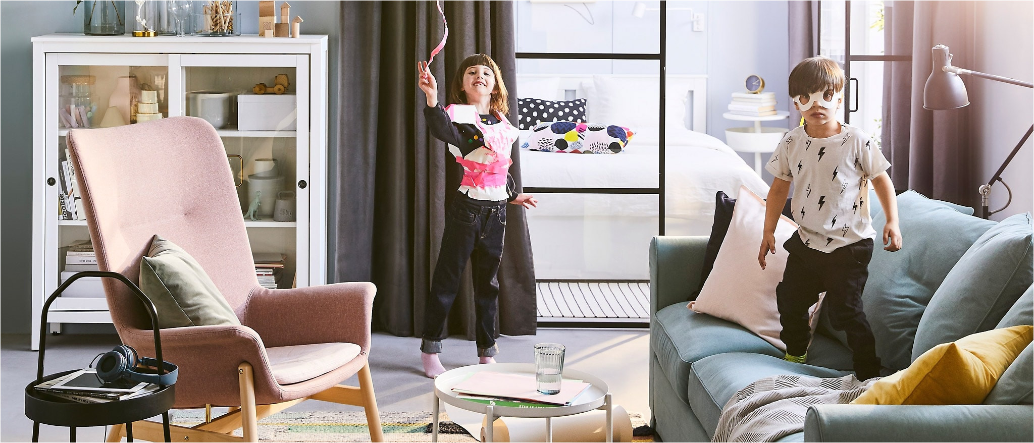 the 2019 ikea catalogue cover features two children playing in a living room they can
