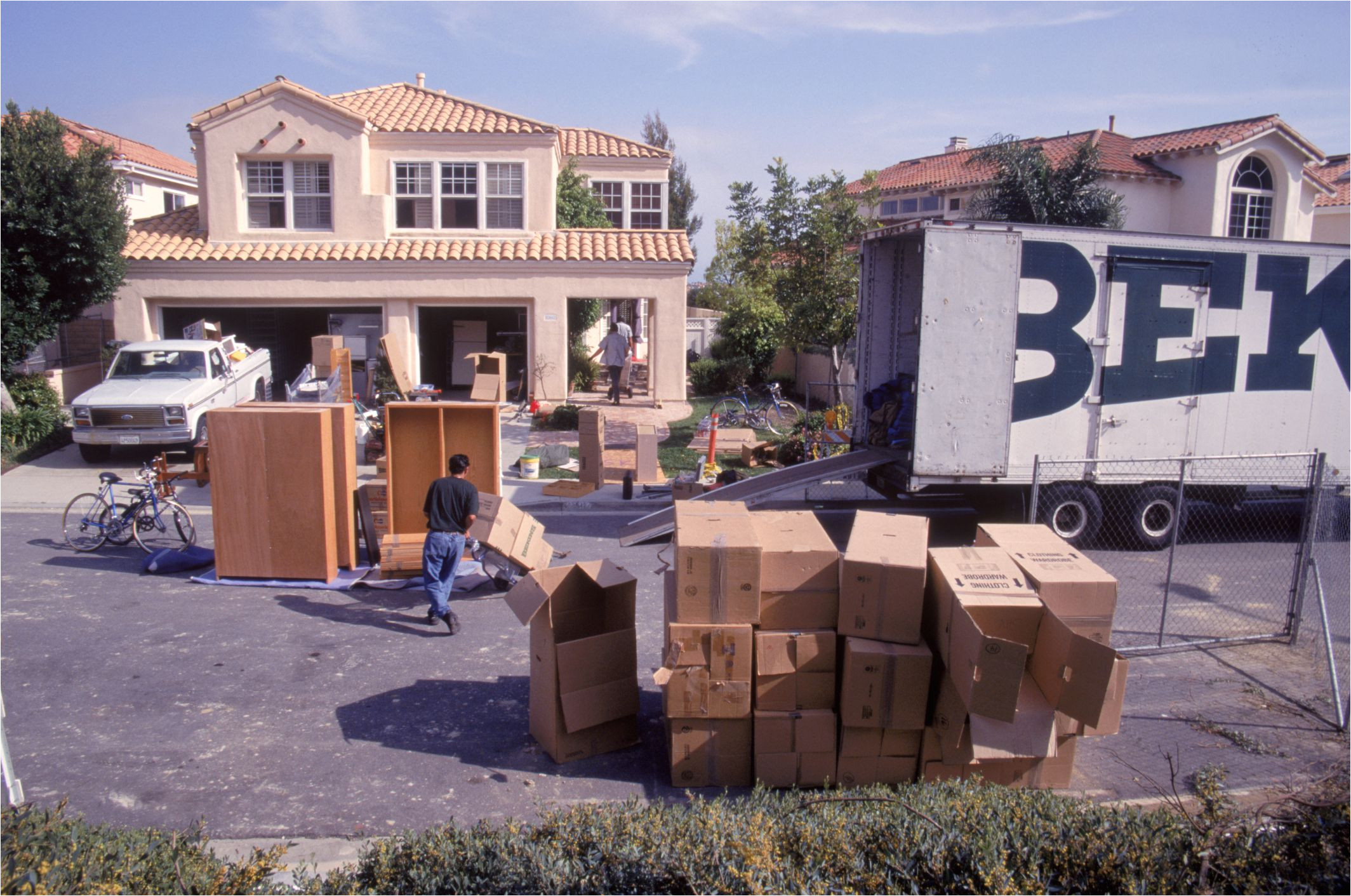 movingboxesinfrontofhome spencergrant photolibrary 56a1dee23df78cf7726f5eec jpg