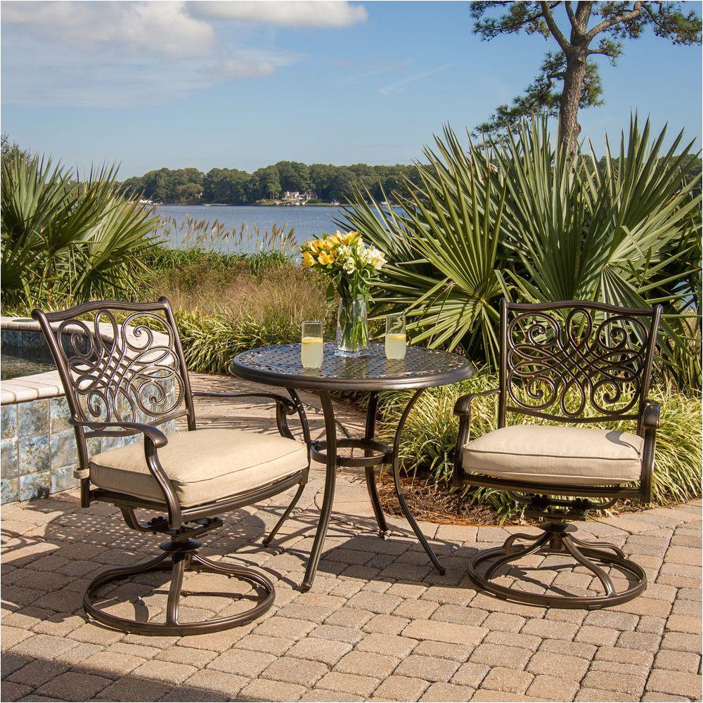 traditions 3 piece patio bistro set with 2 cast aluminum swivel rockers with beige