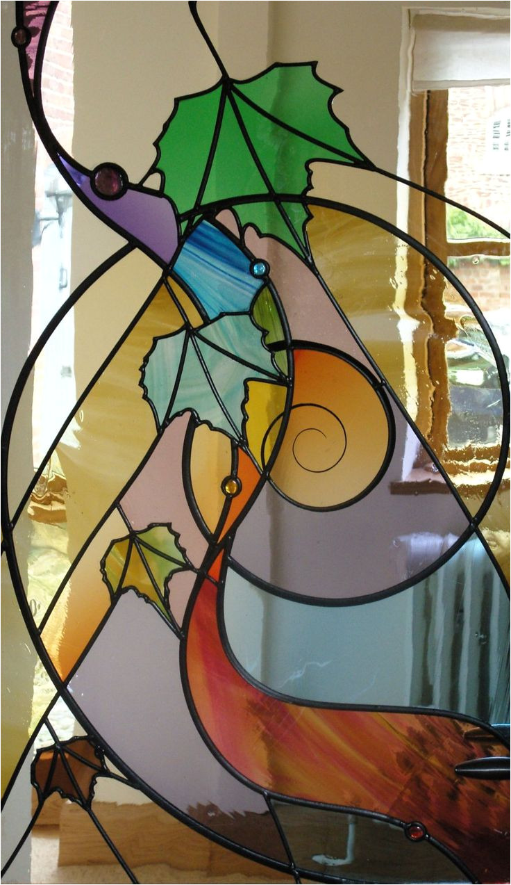 this is glorious work from the stained glass artist dave griffin i love the natural shapes and swirls