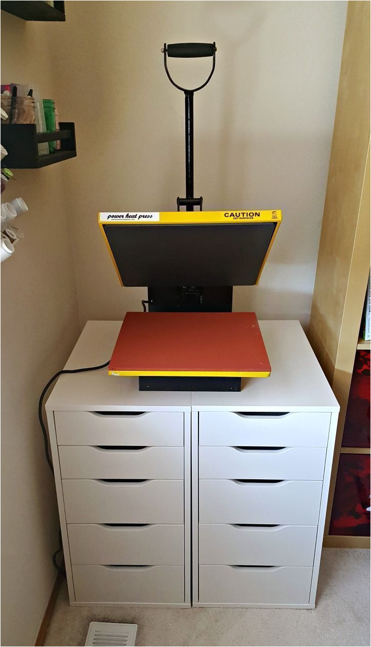 the ikea alex drawers are the perfect multi purpose solution for storing both vinyl and the heat press keep your craft area neat and organized