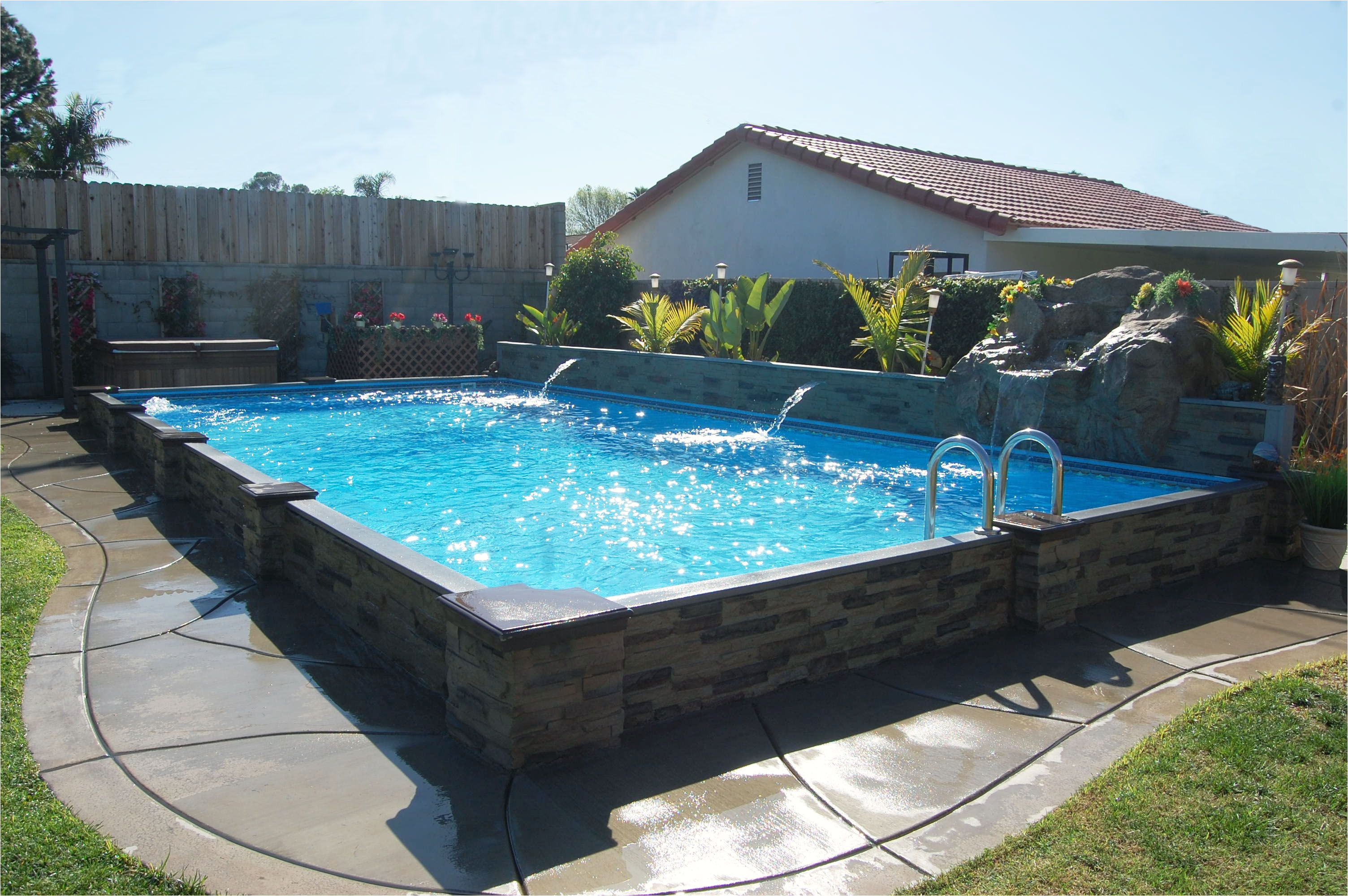 this exlusive islander pool is 14 x 28 with a rock waterfall and 2 cascades